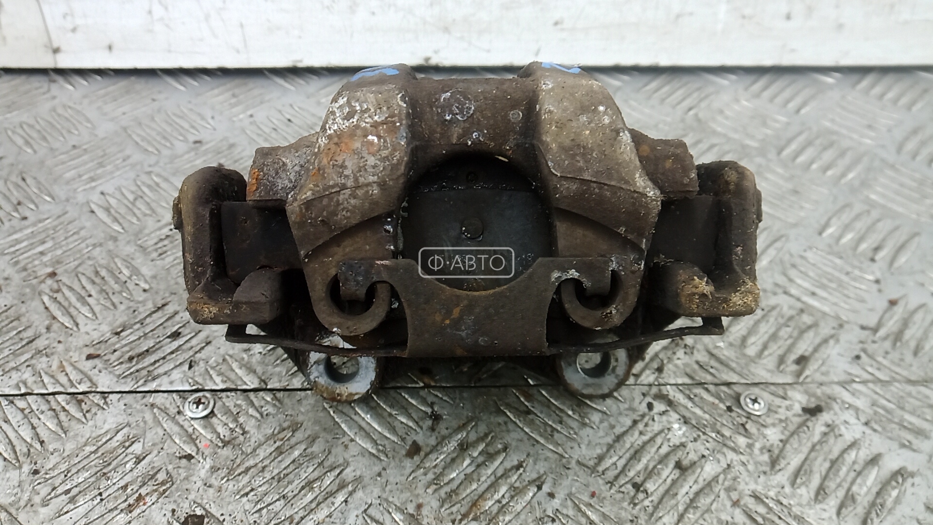 Суппорт тормозной задний левый