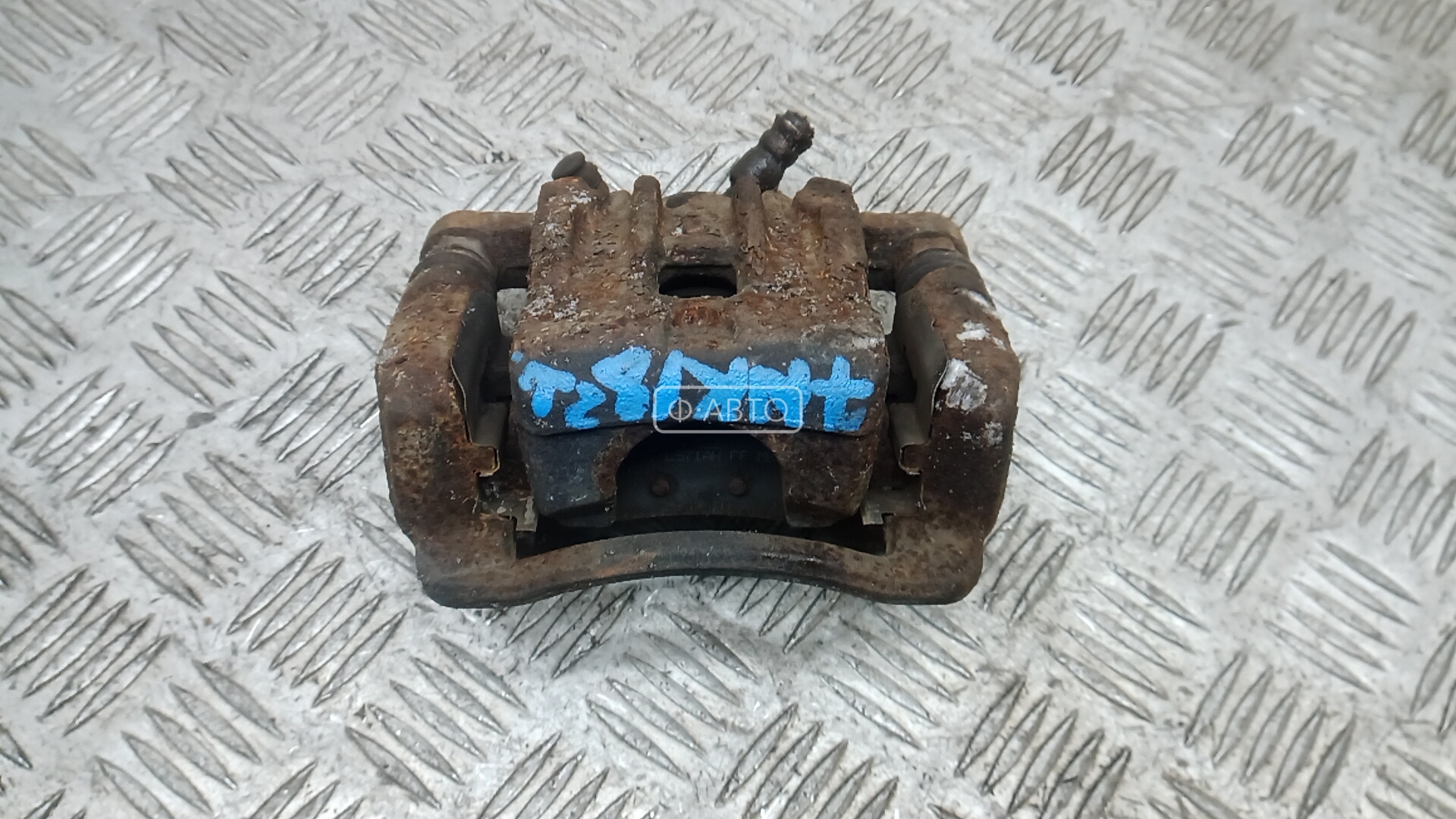 Суппорт тормозной задний левый