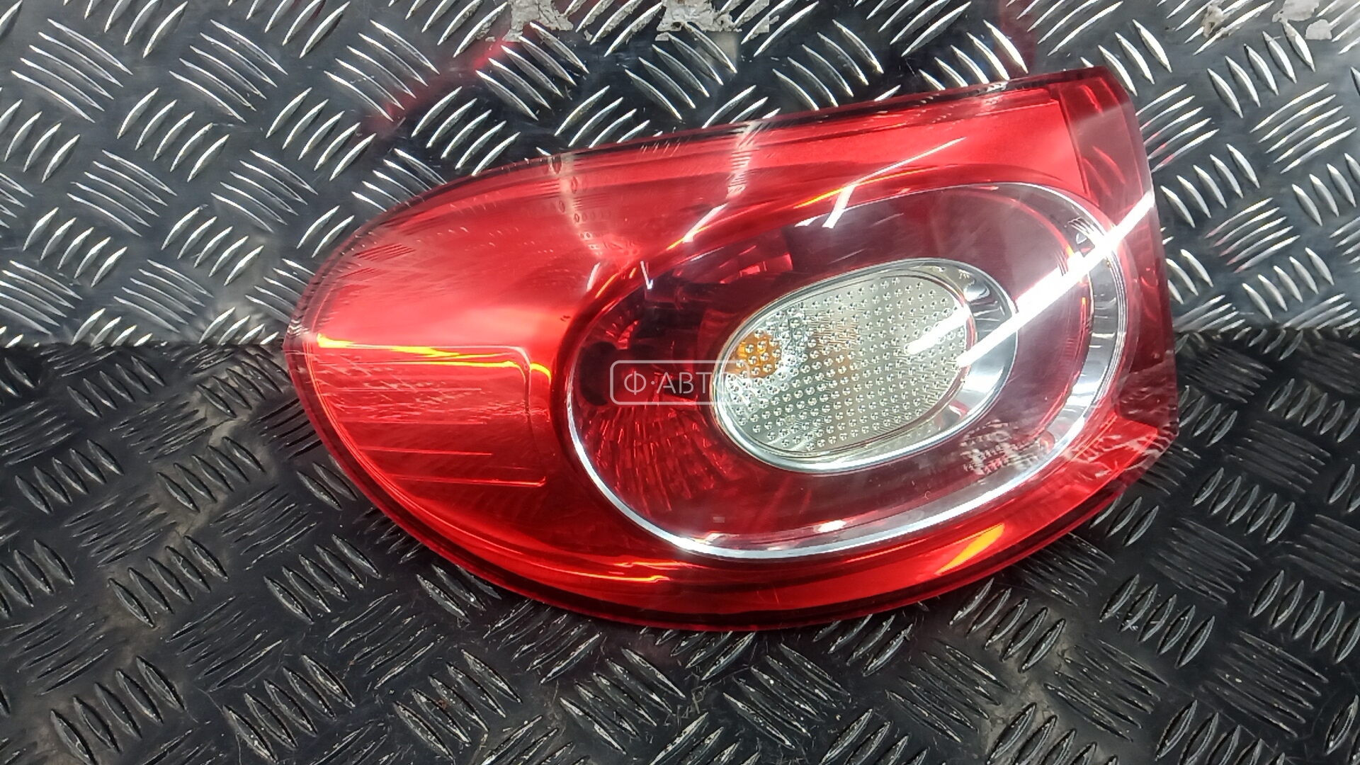 Фонарь задний левый