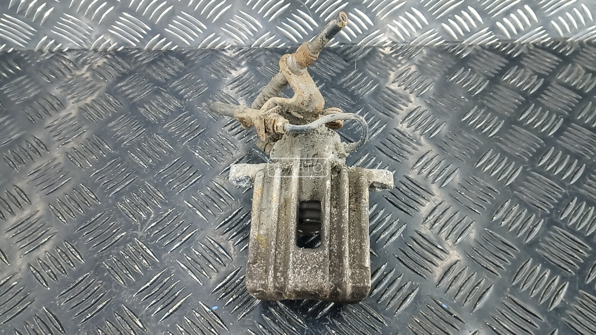 Суппорт тормозной задний правый