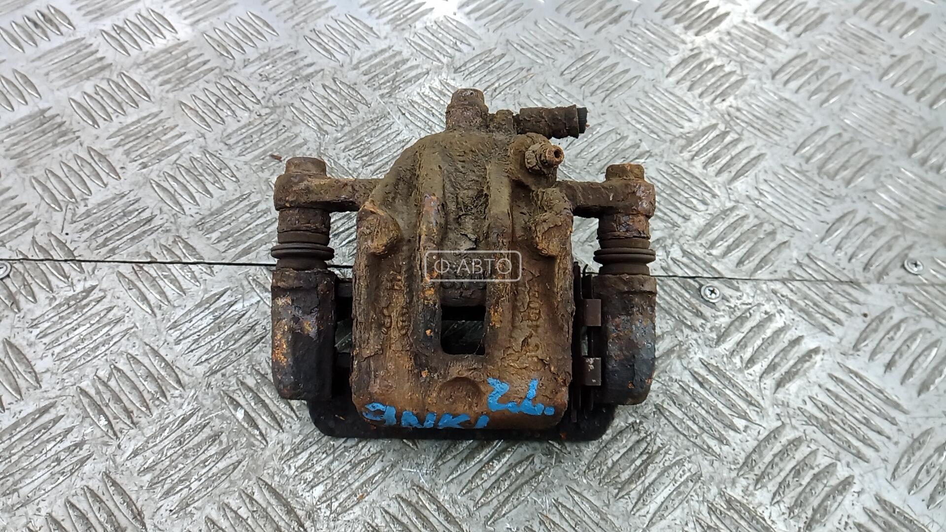 Суппорт тормозной задний левый