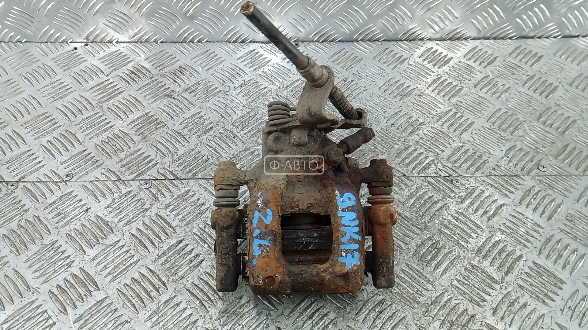 Суппорт тормозной задний левый