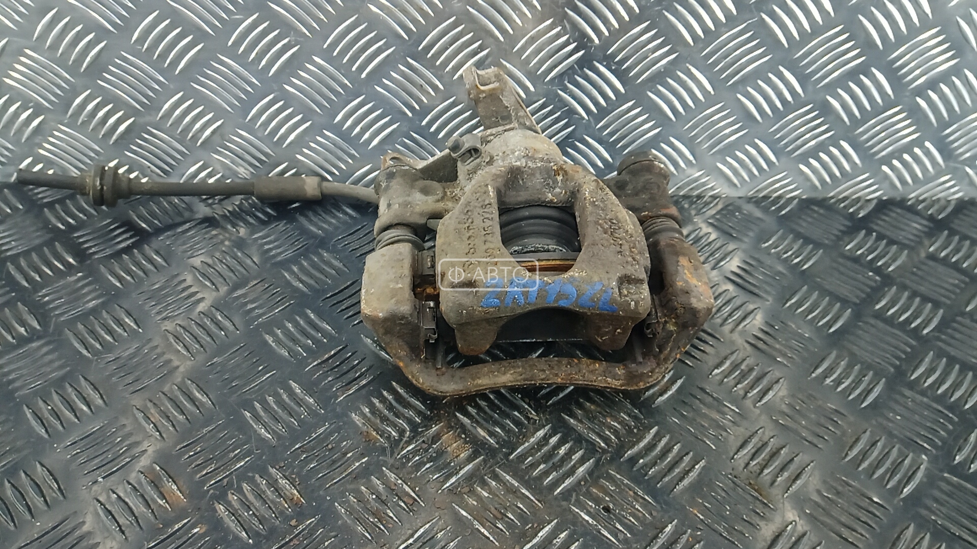 Суппорт тормозной задний левый