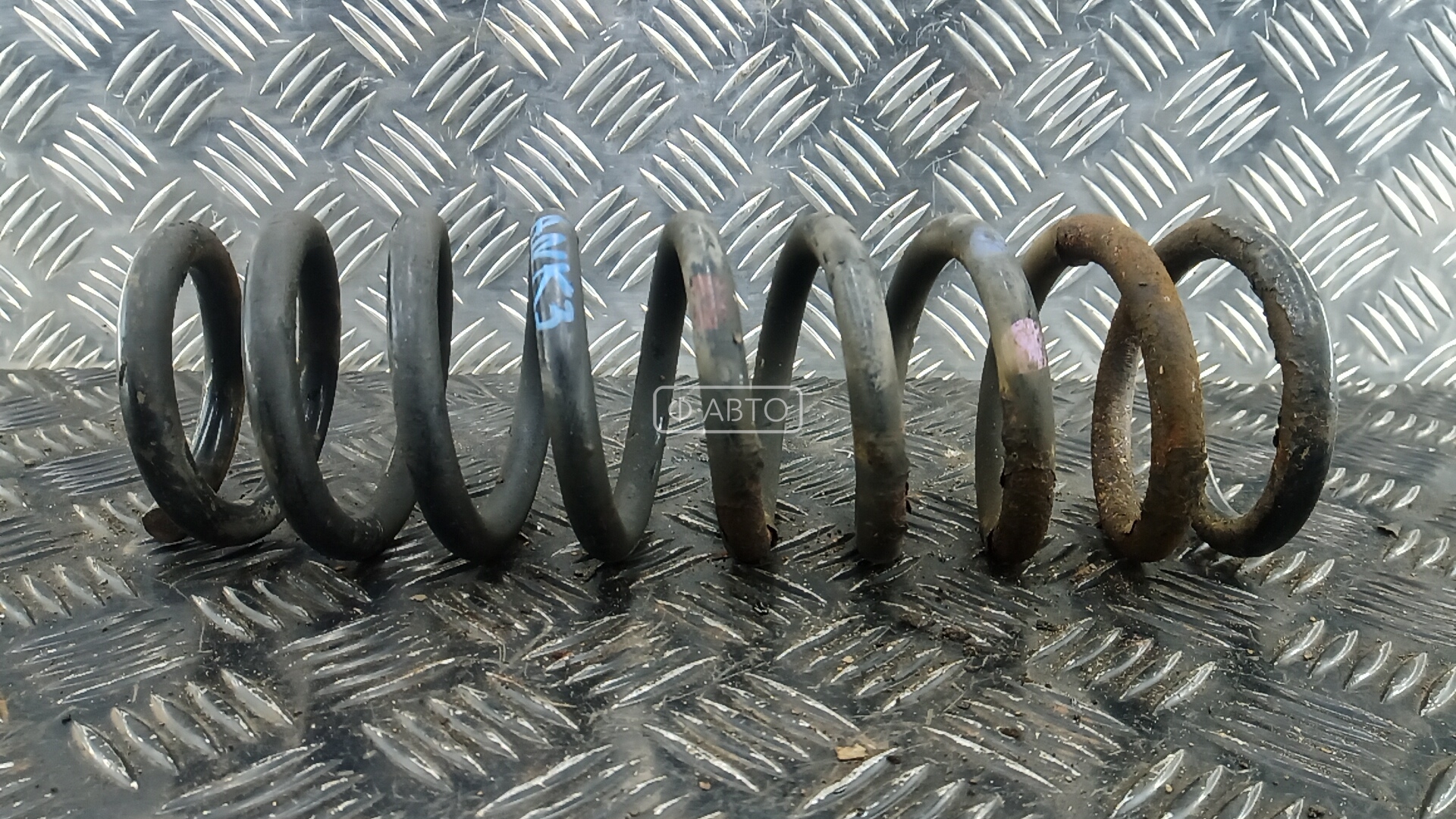 Пружина задняя