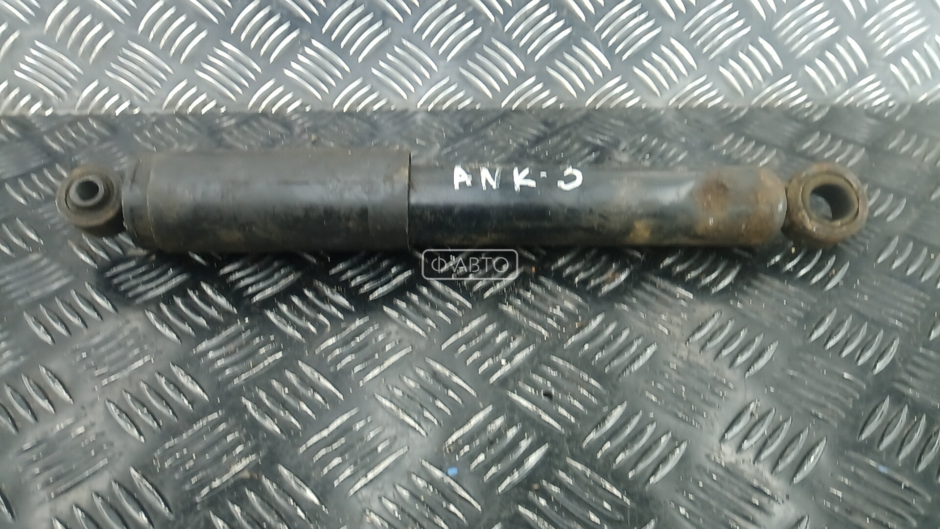 Амортизатор задней балки