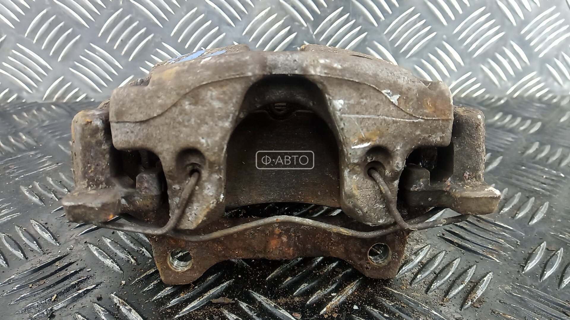 Суппорт тормозной задний левый