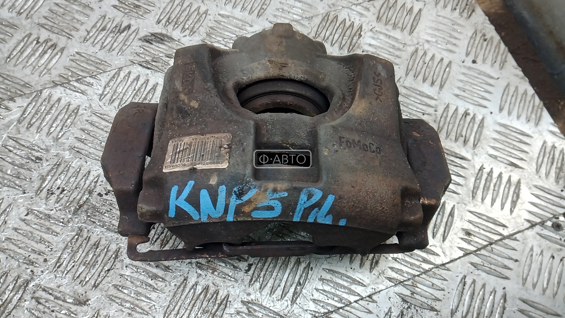 Суппорт тормозной передний левый