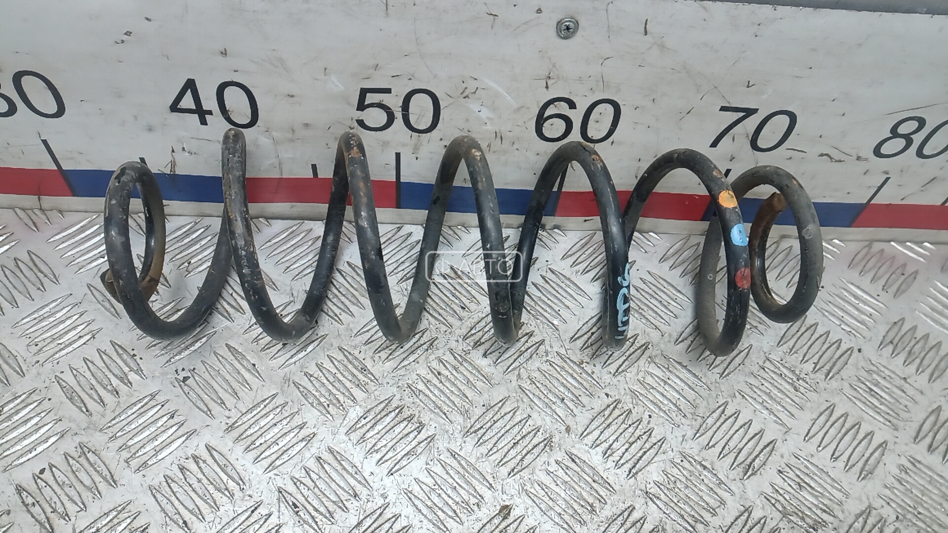 Пружина задняя