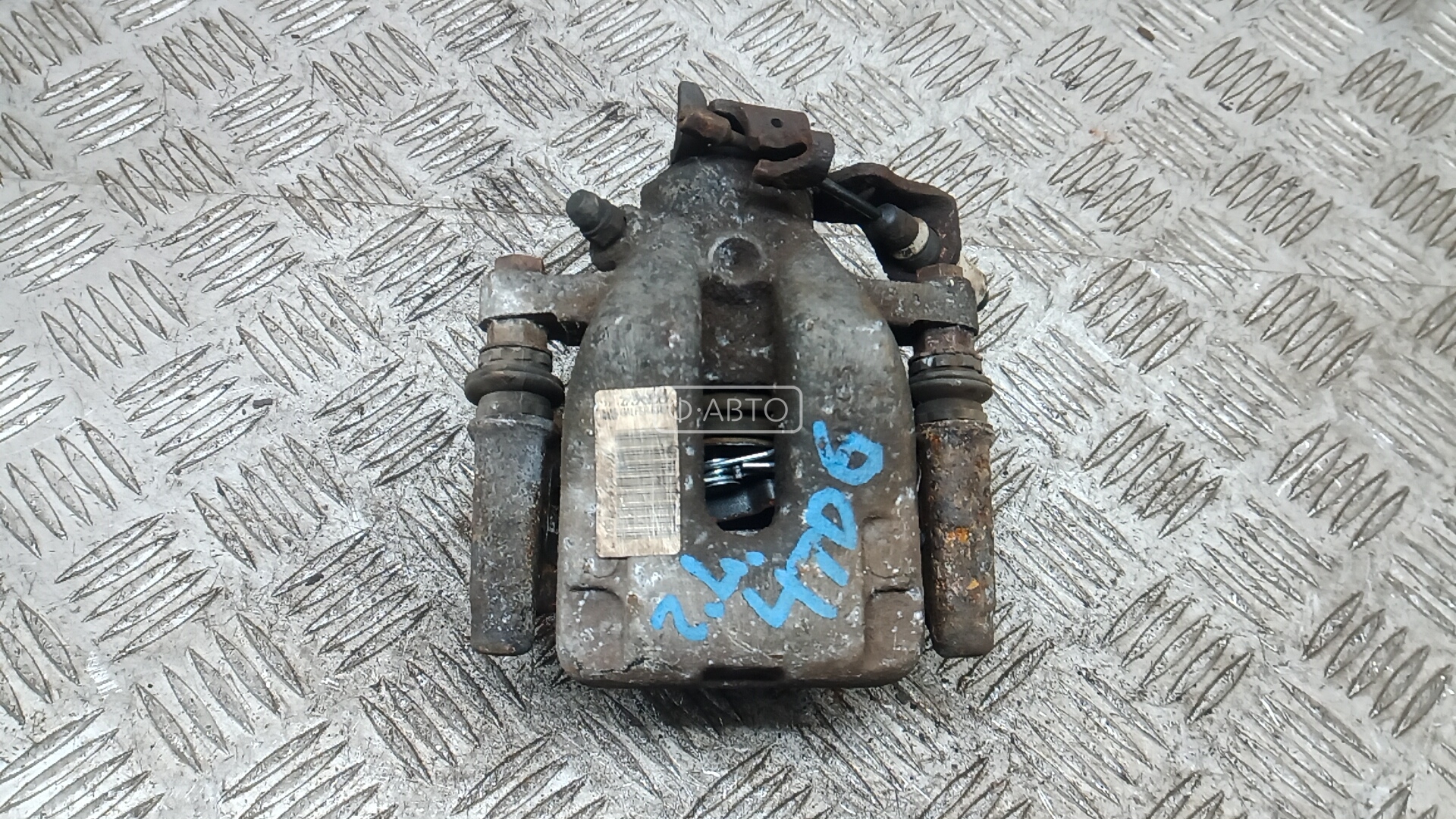 Суппорт тормозной задний левый