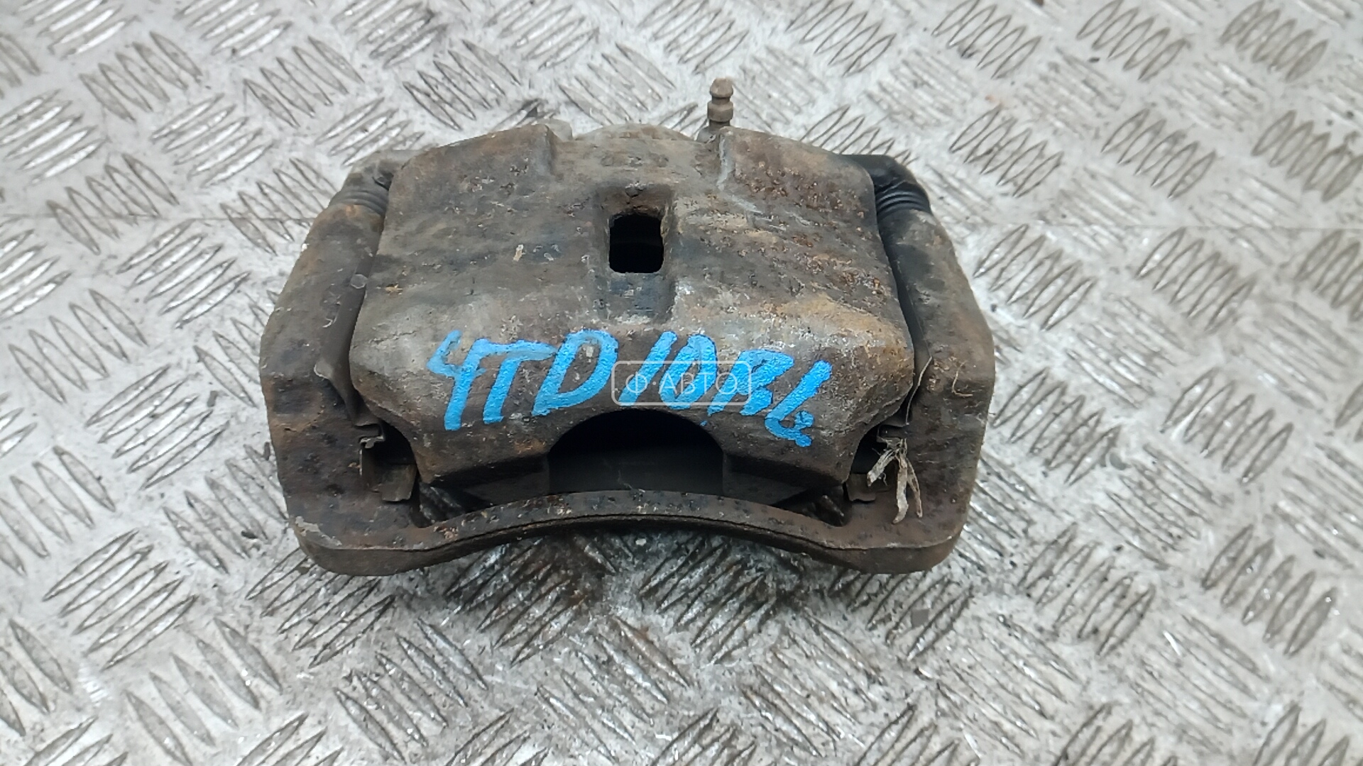 Суппорт тормозной передний левый