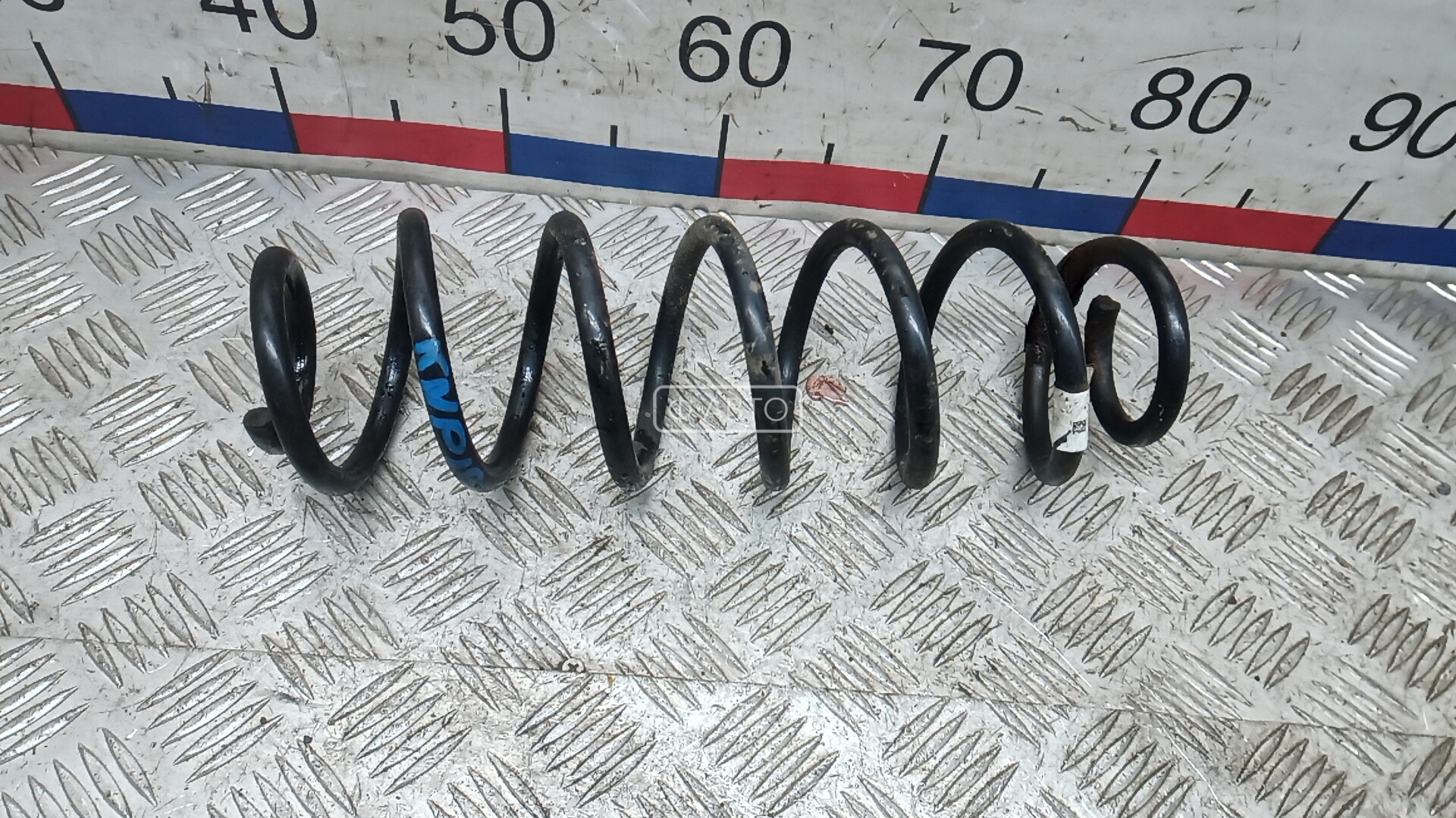 Пружина задняя