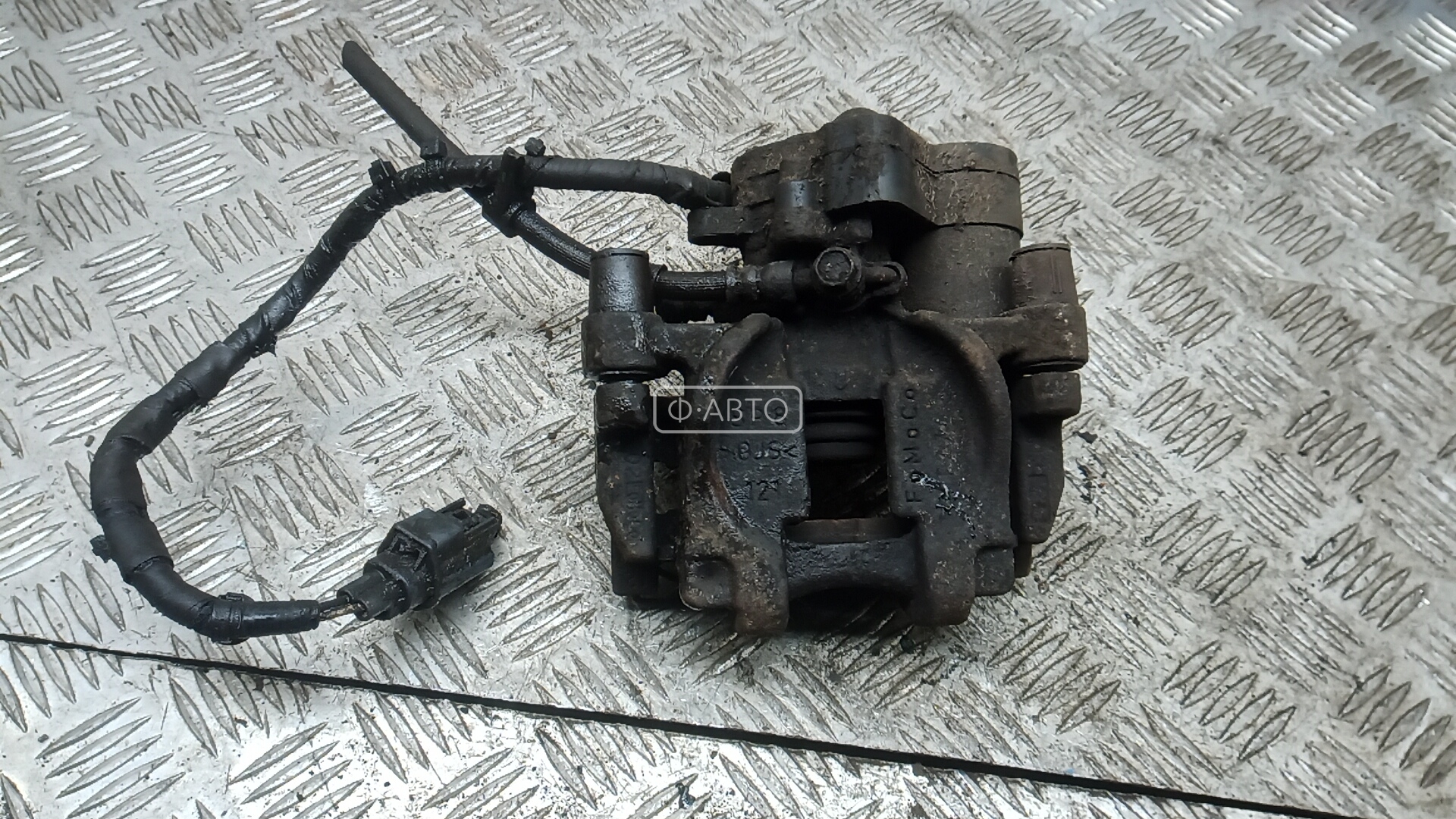 Суппорт тормозной задний левый