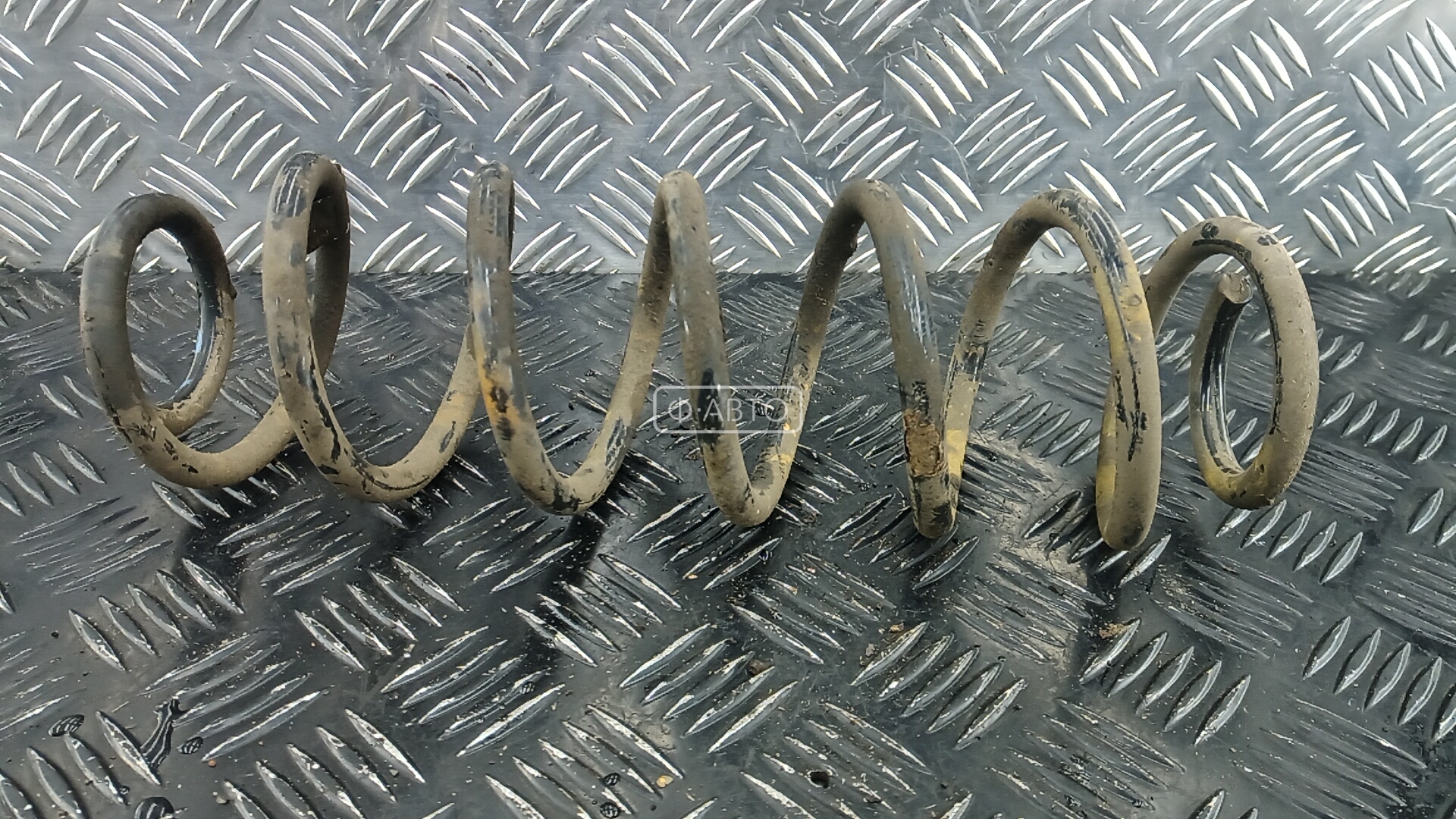 Пружина задняя