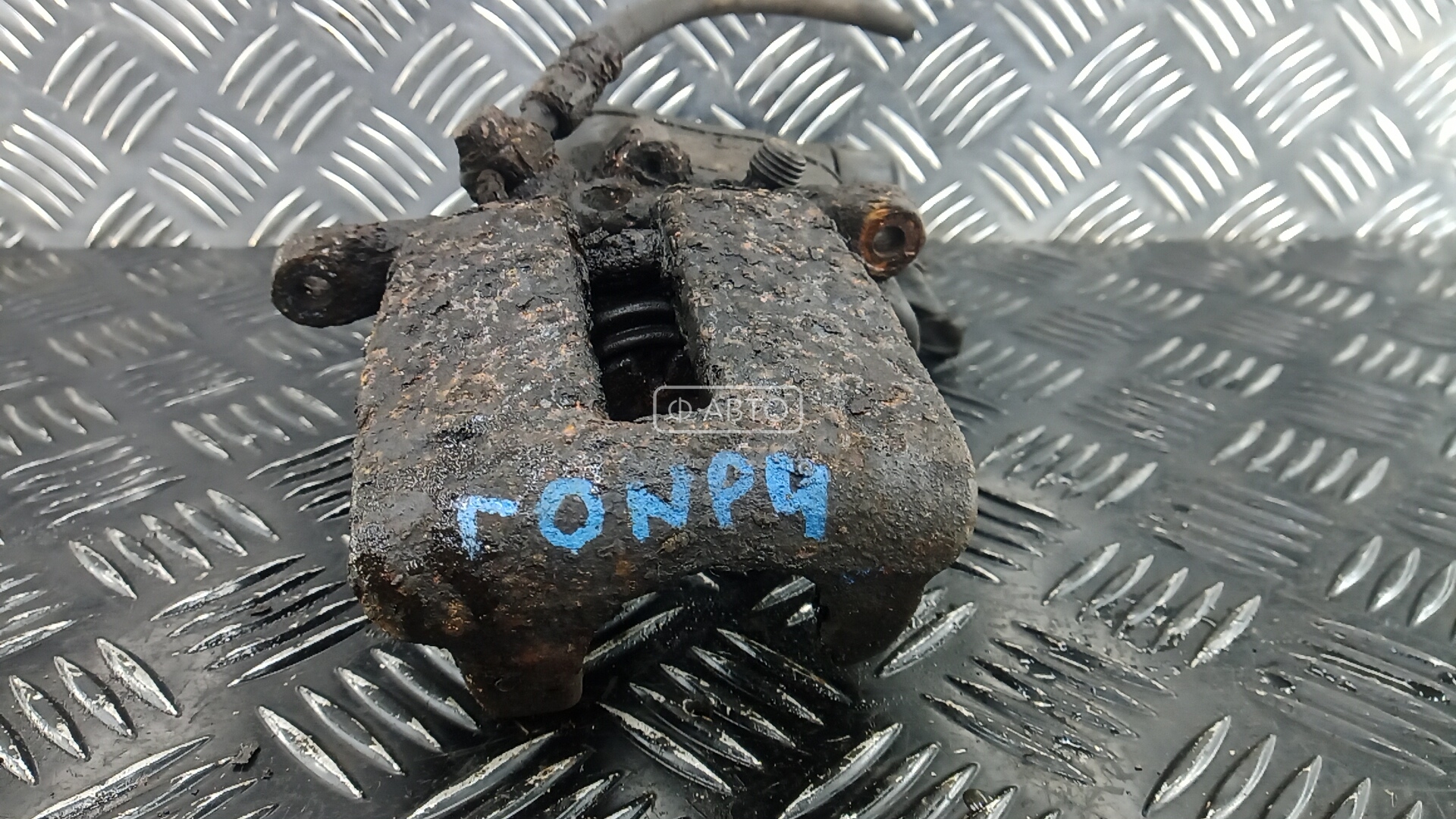 Суппорт тормозной задний левый