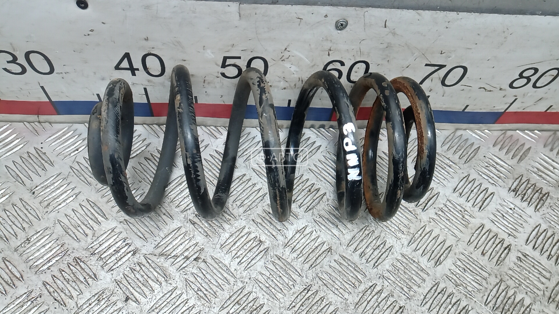 Пружина задняя