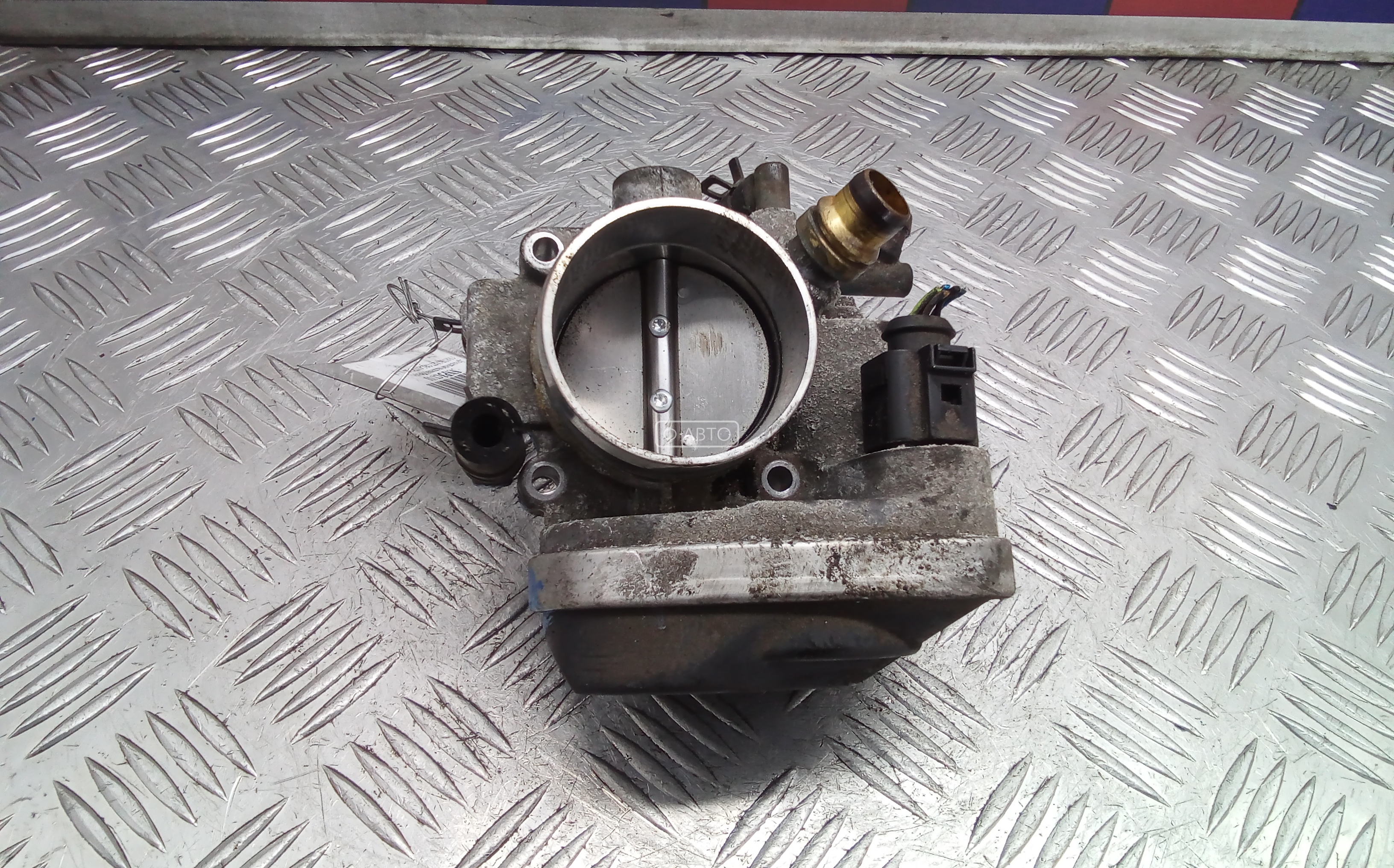 Дроссельная заслонка бензиновая