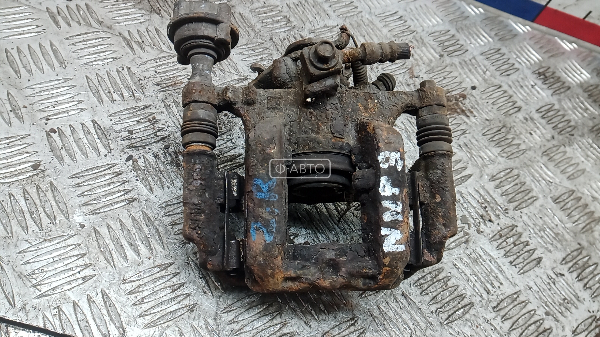 Суппорт тормозной задний правый