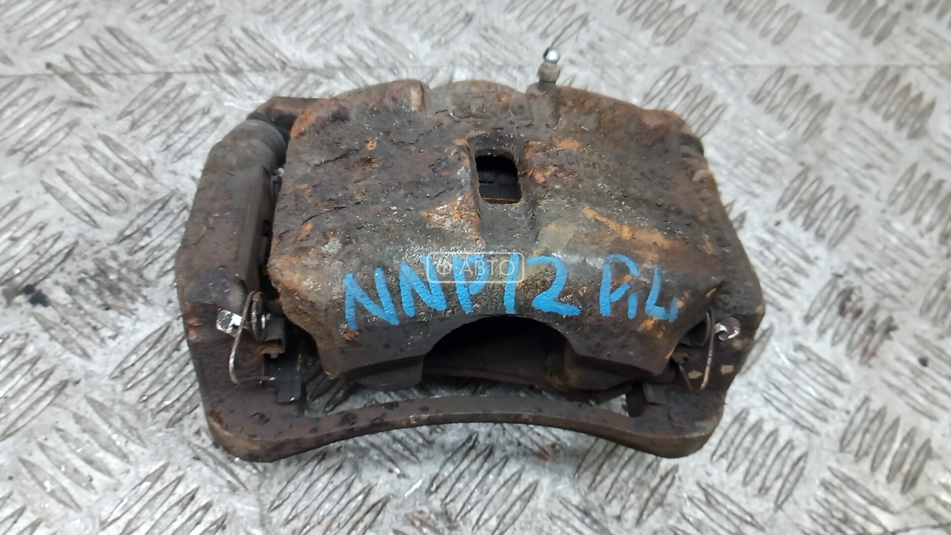 Суппорт тормозной передний левый