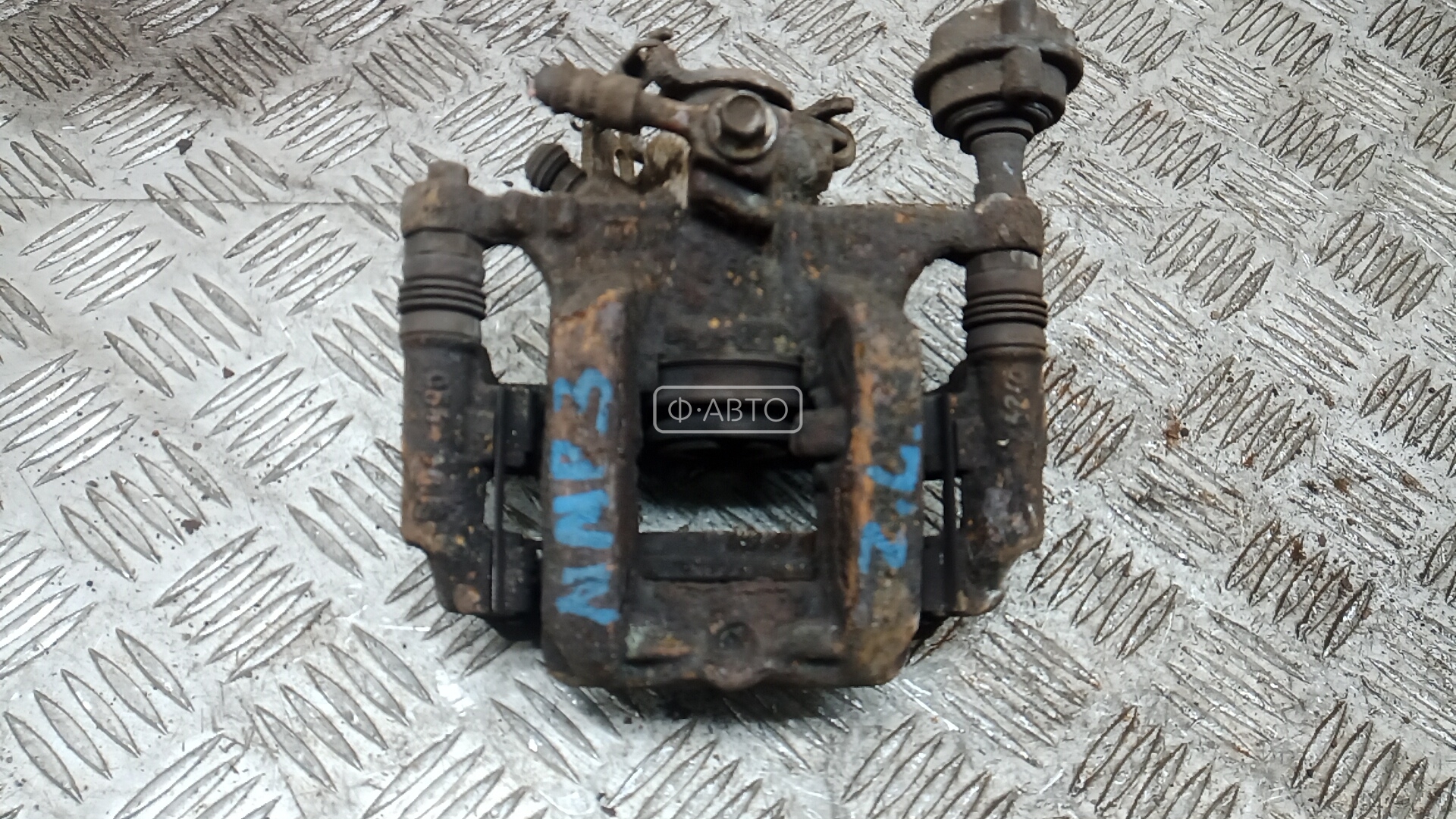 Суппорт тормозной задний левый