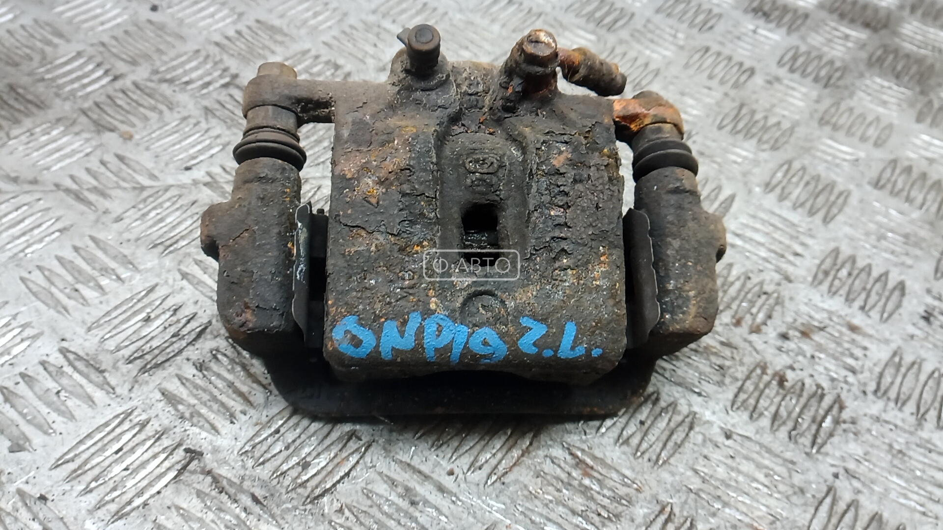 Суппорт тормозной задний левый