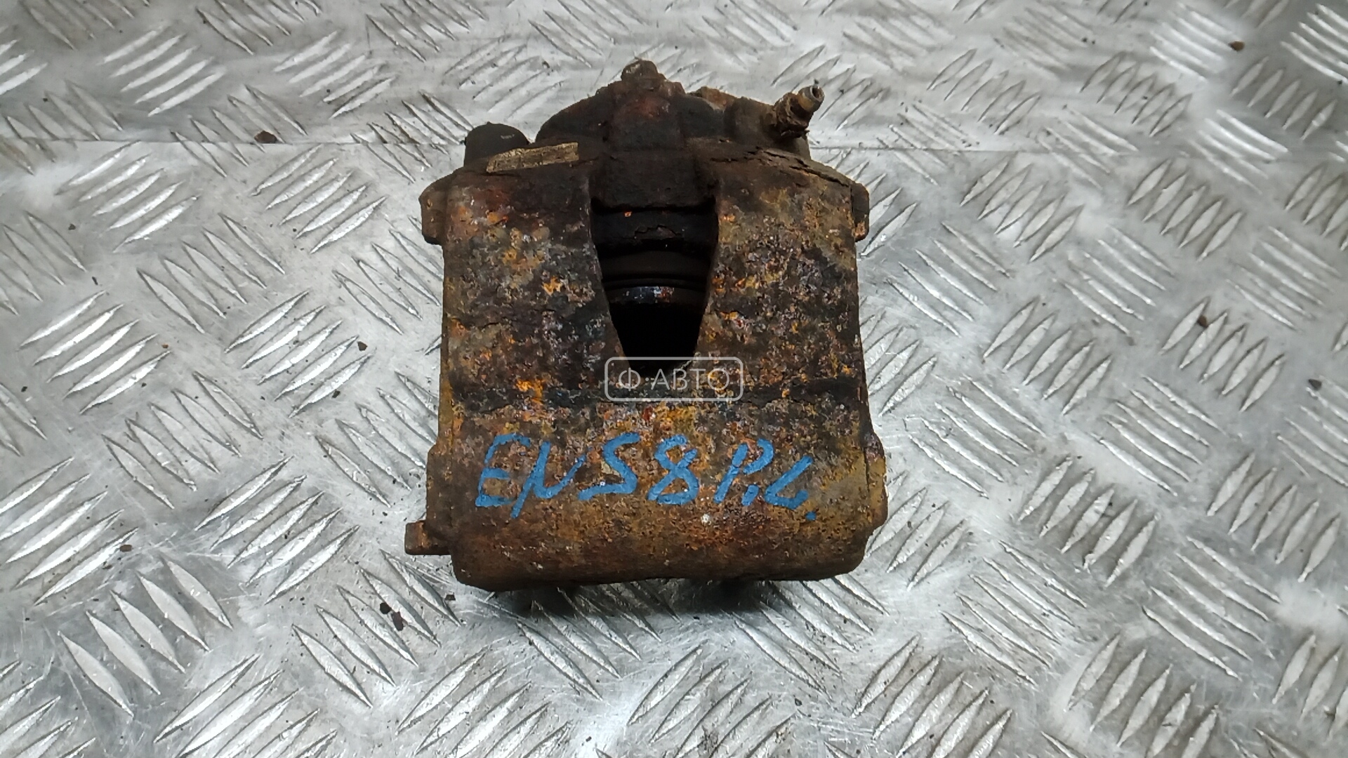 Суппорт тормозной передний левый