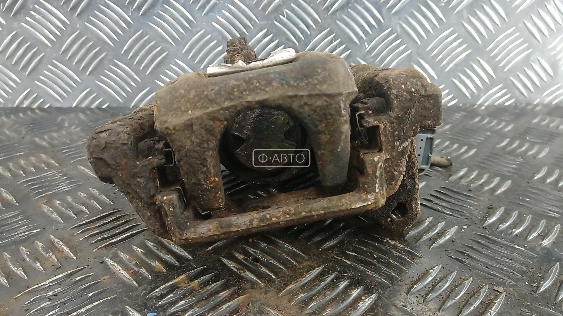 Суппорт тормозной задний правый