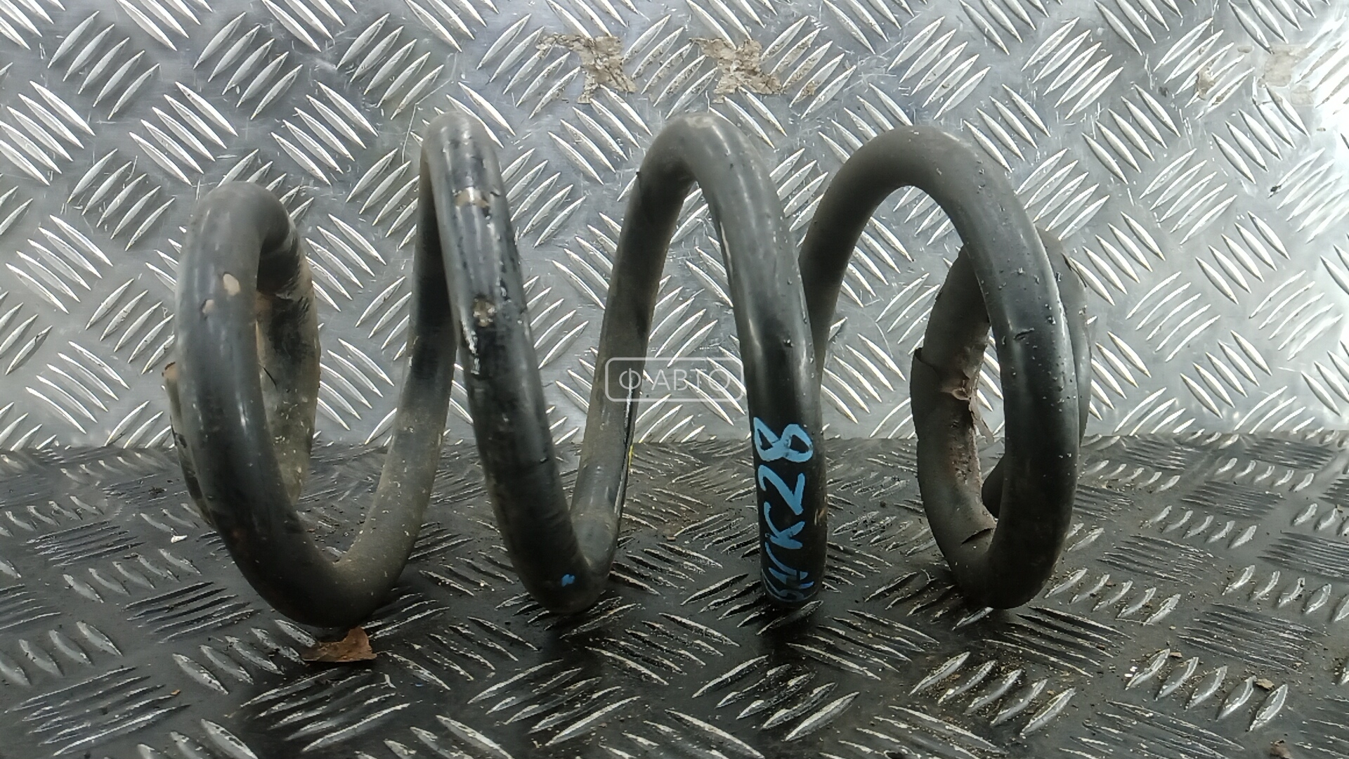 Пружина задняя