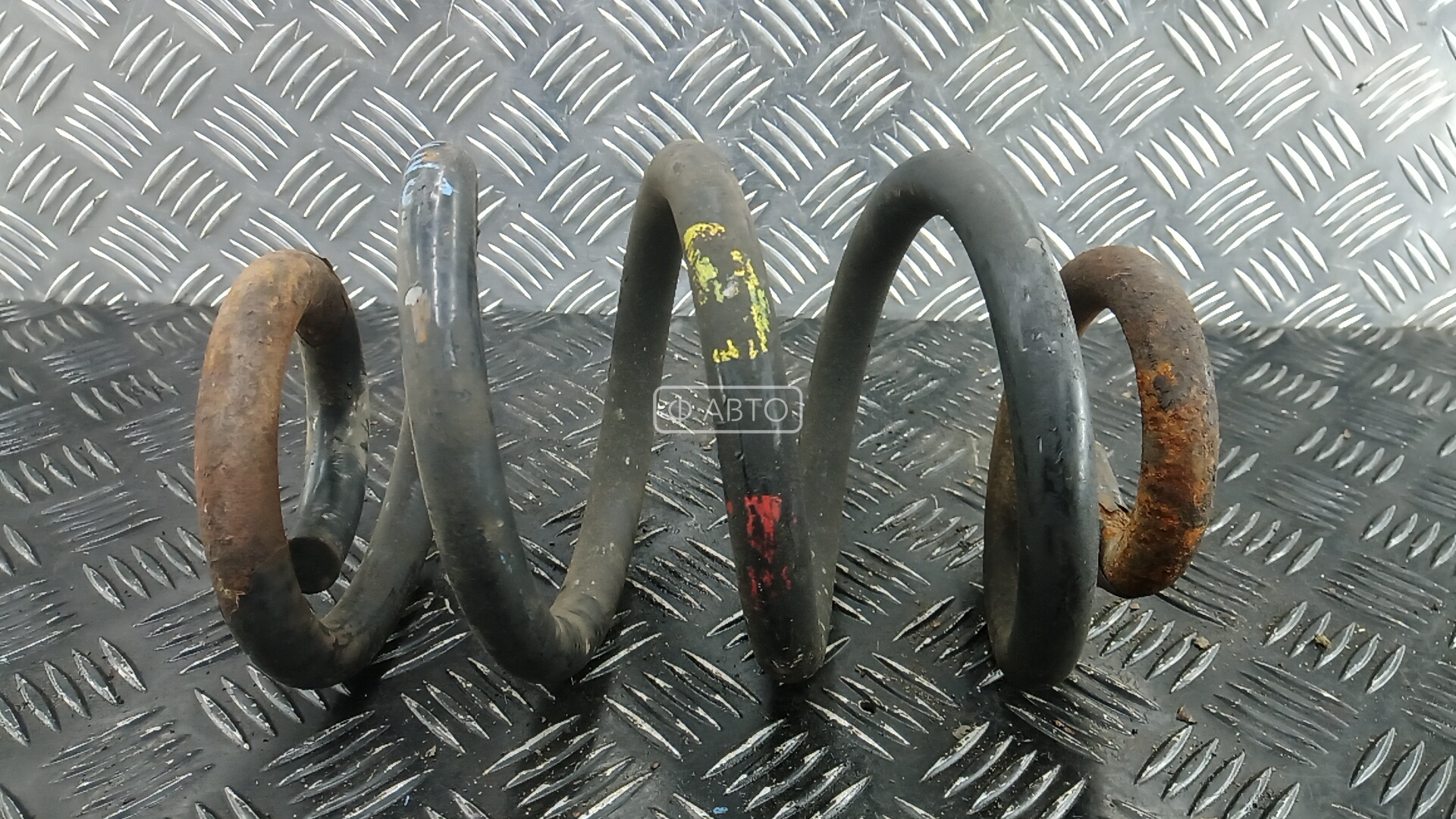 Пружина задняя