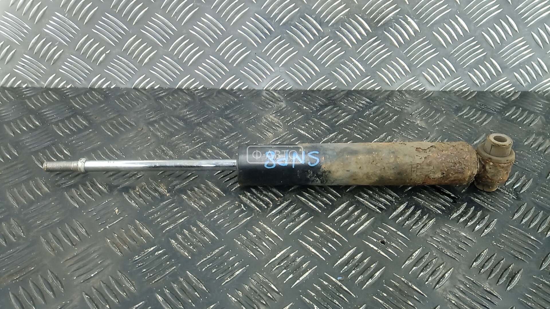 Амортизатор задней балки