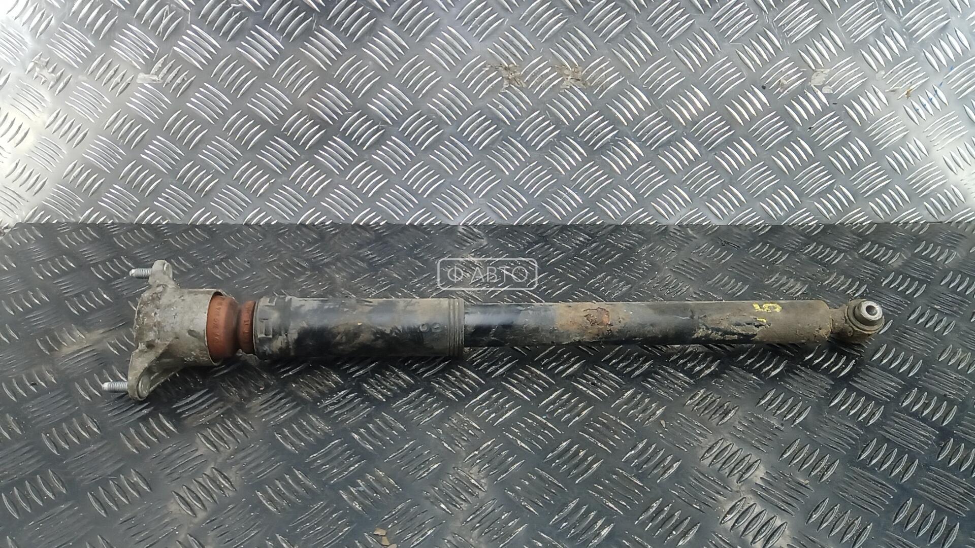 Амортизатор задней балки