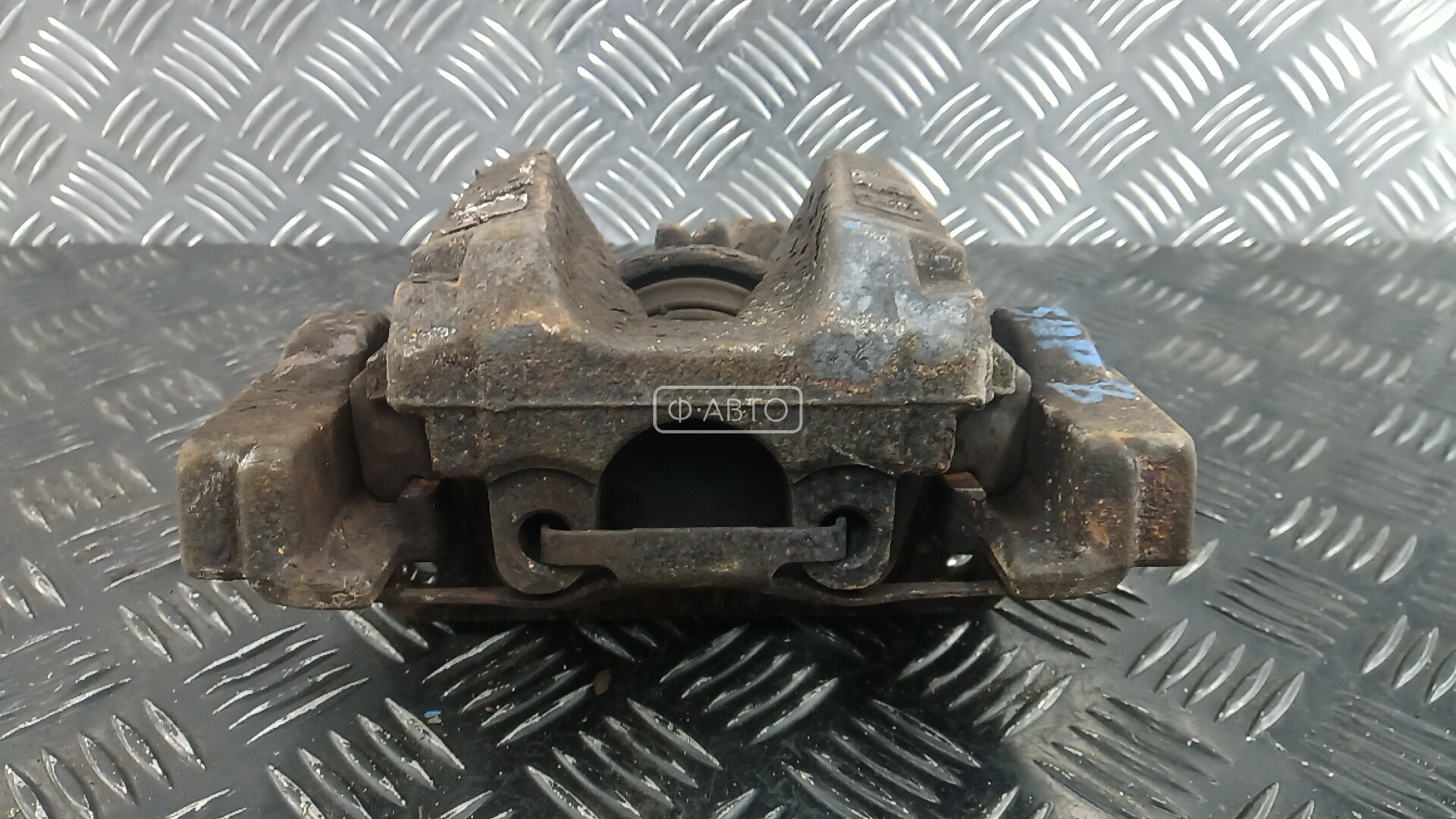 Суппорт тормозной передний левый