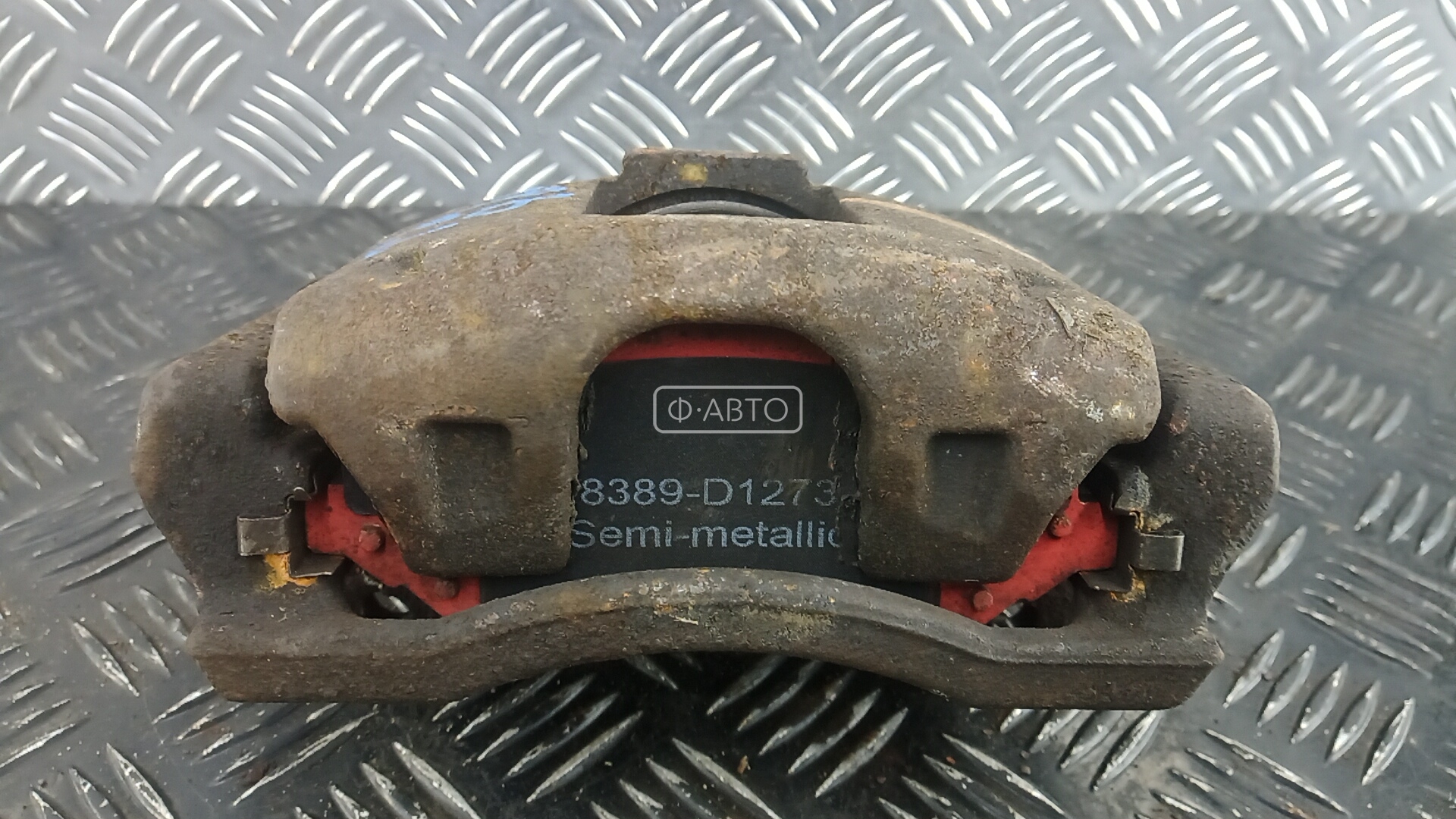 Суппорт тормозной передний левый