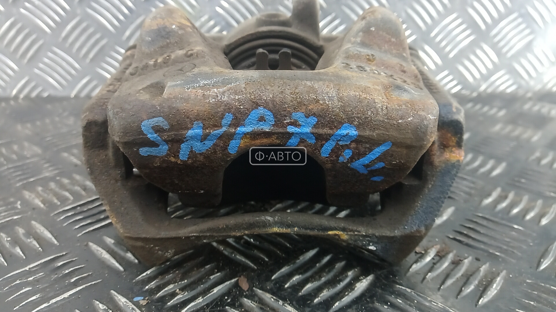 Суппорт тормозной передний левый