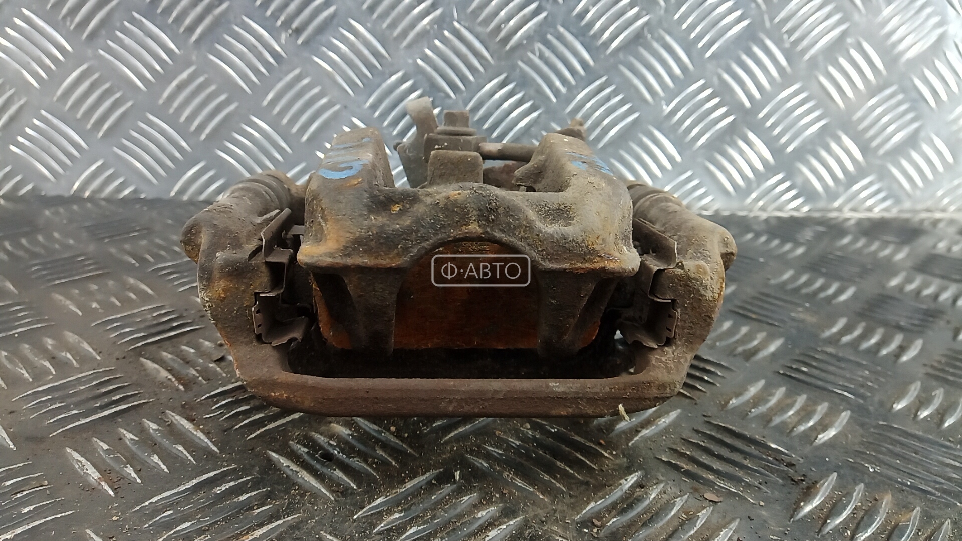 Суппорт тормозной задний левый