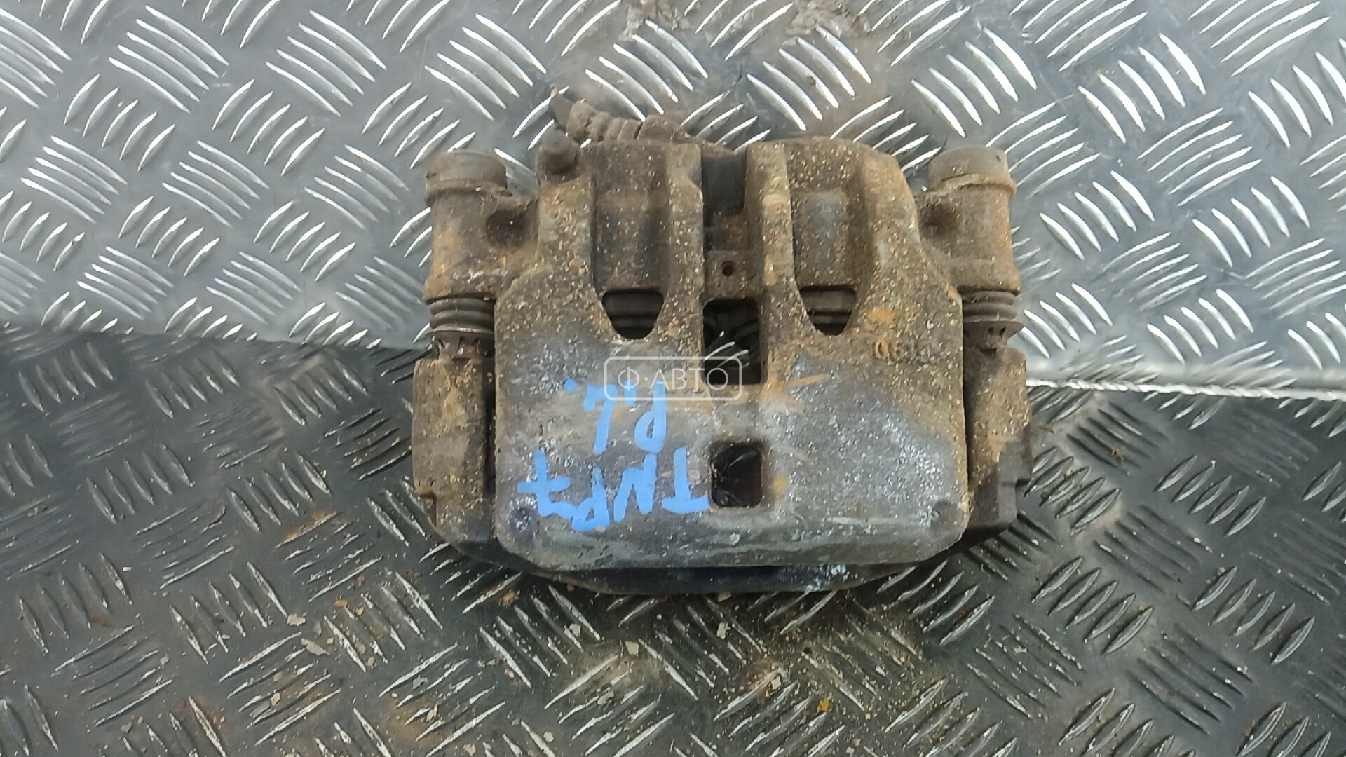 Суппорт тормозной передний левый