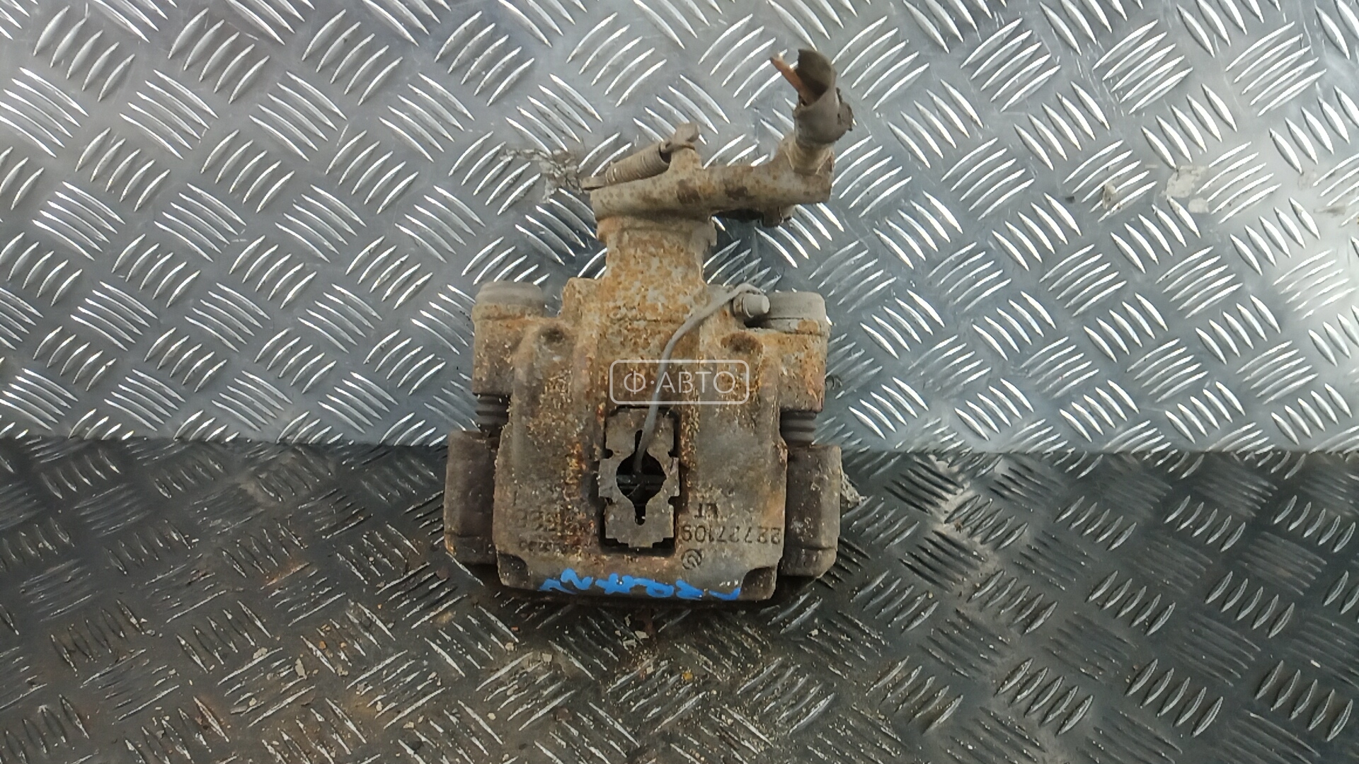 Суппорт тормозной задний левый