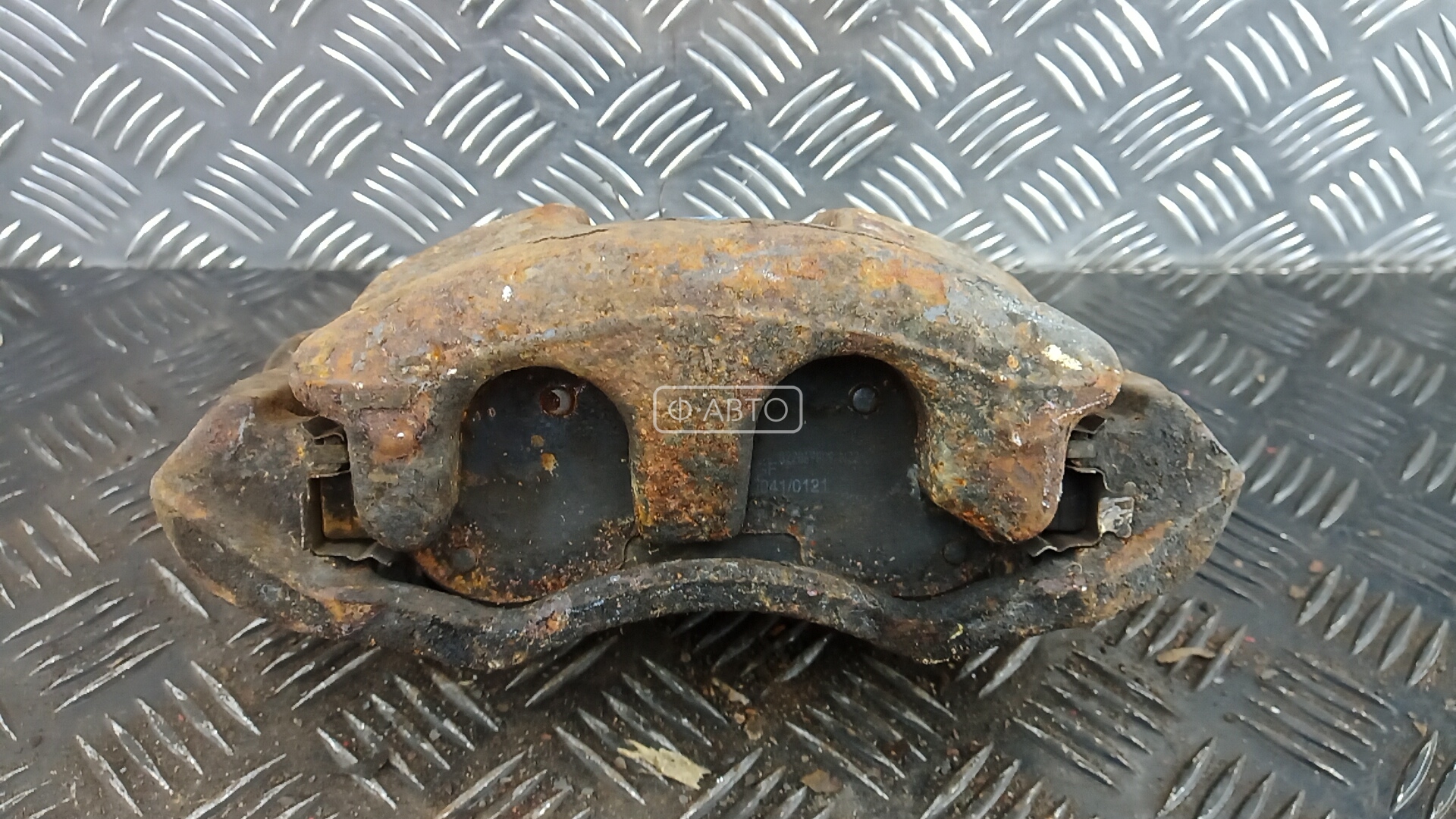 Суппорт тормозной передний левый