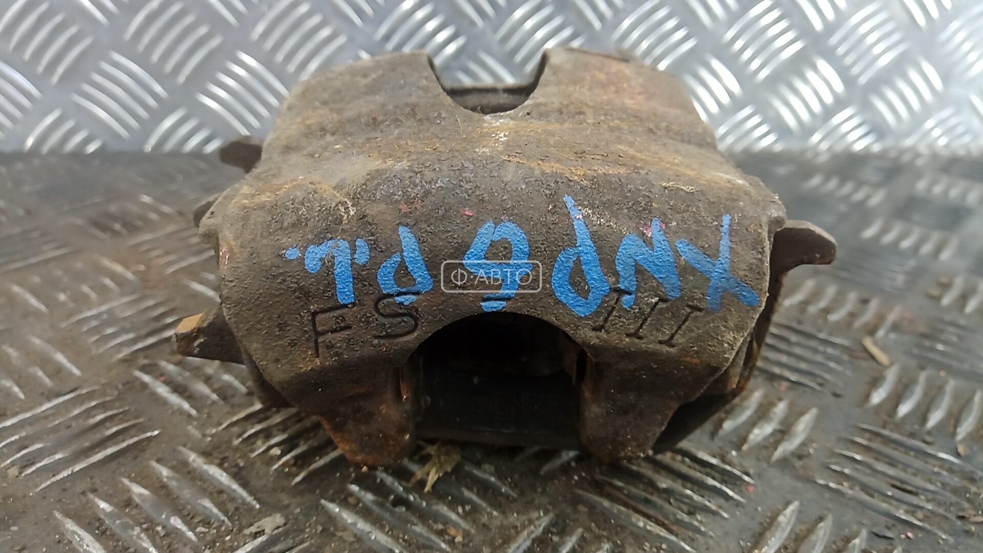 Суппорт тормозной передний левый