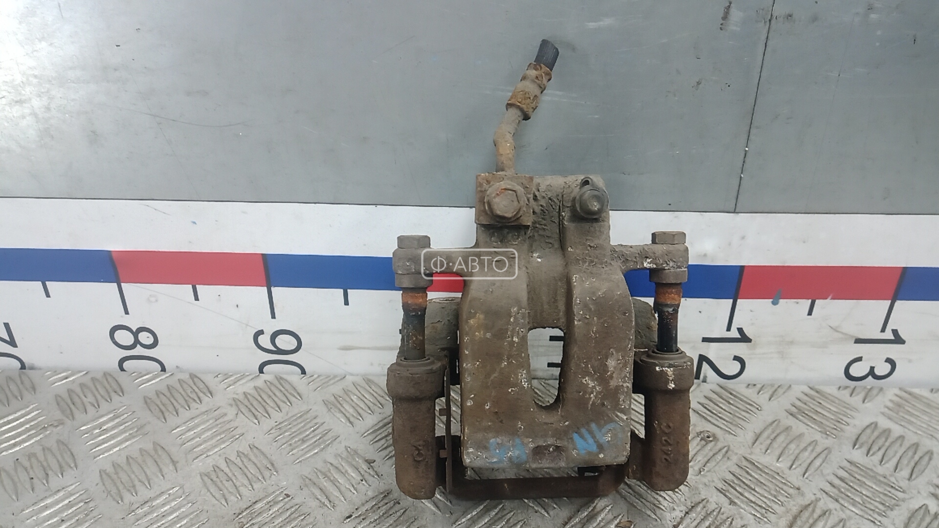 Суппорт тормозной задний левый