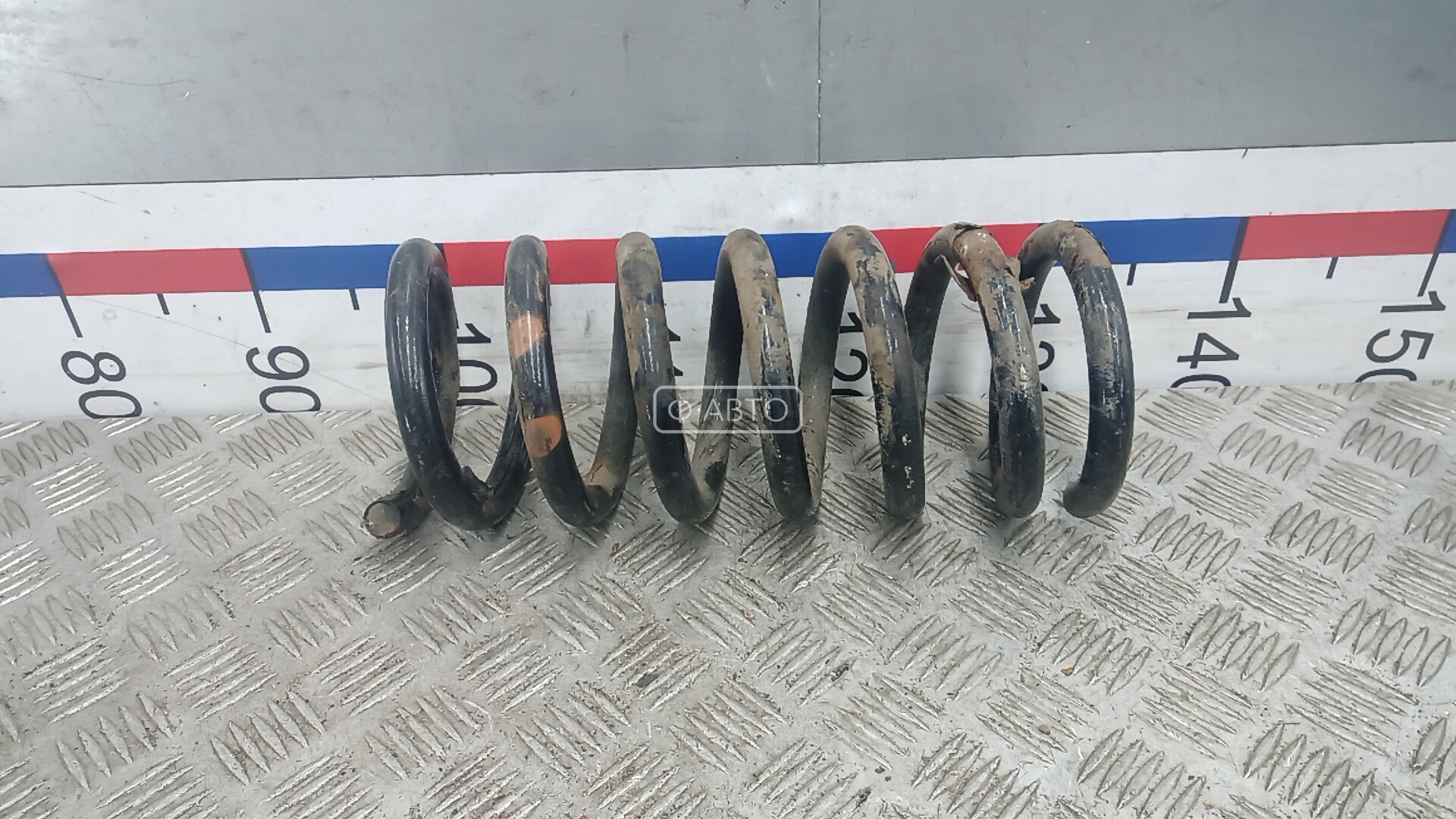 Пружина задняя