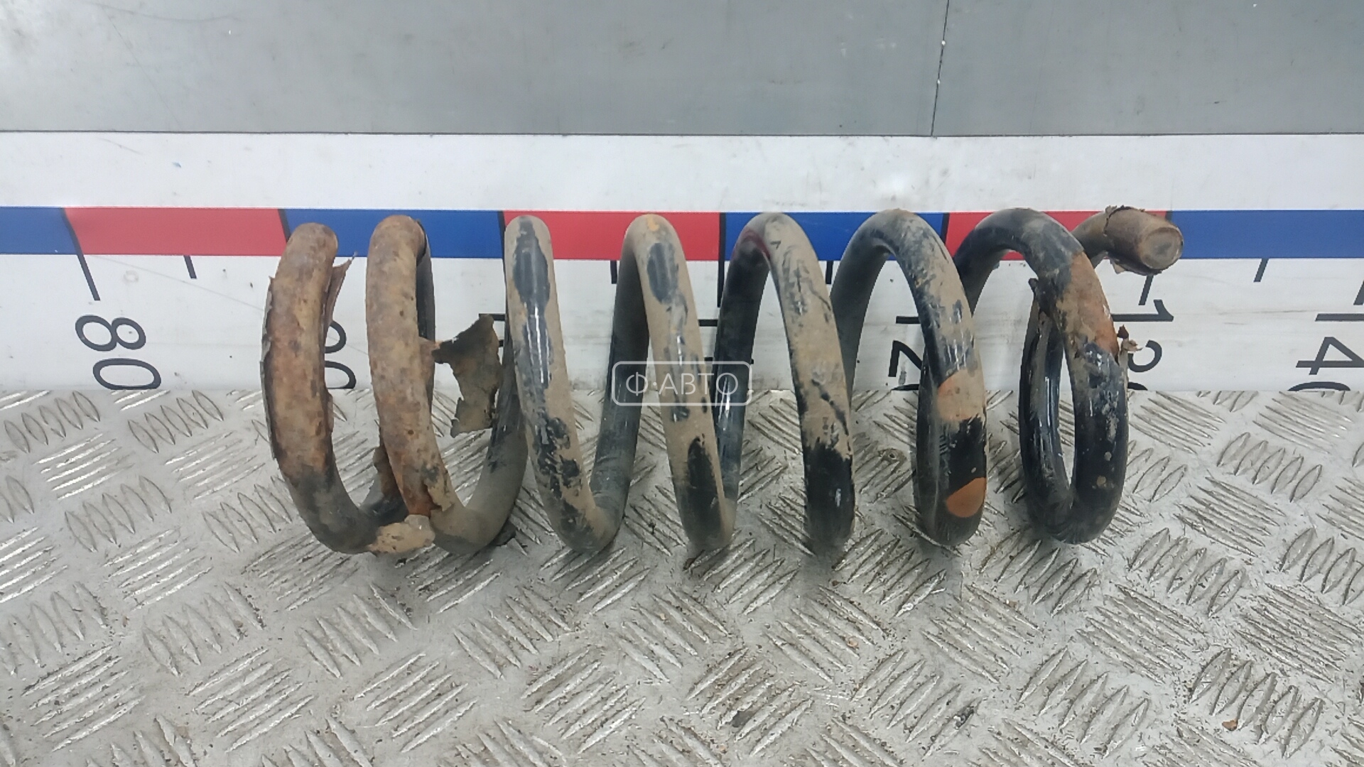 Пружина задняя