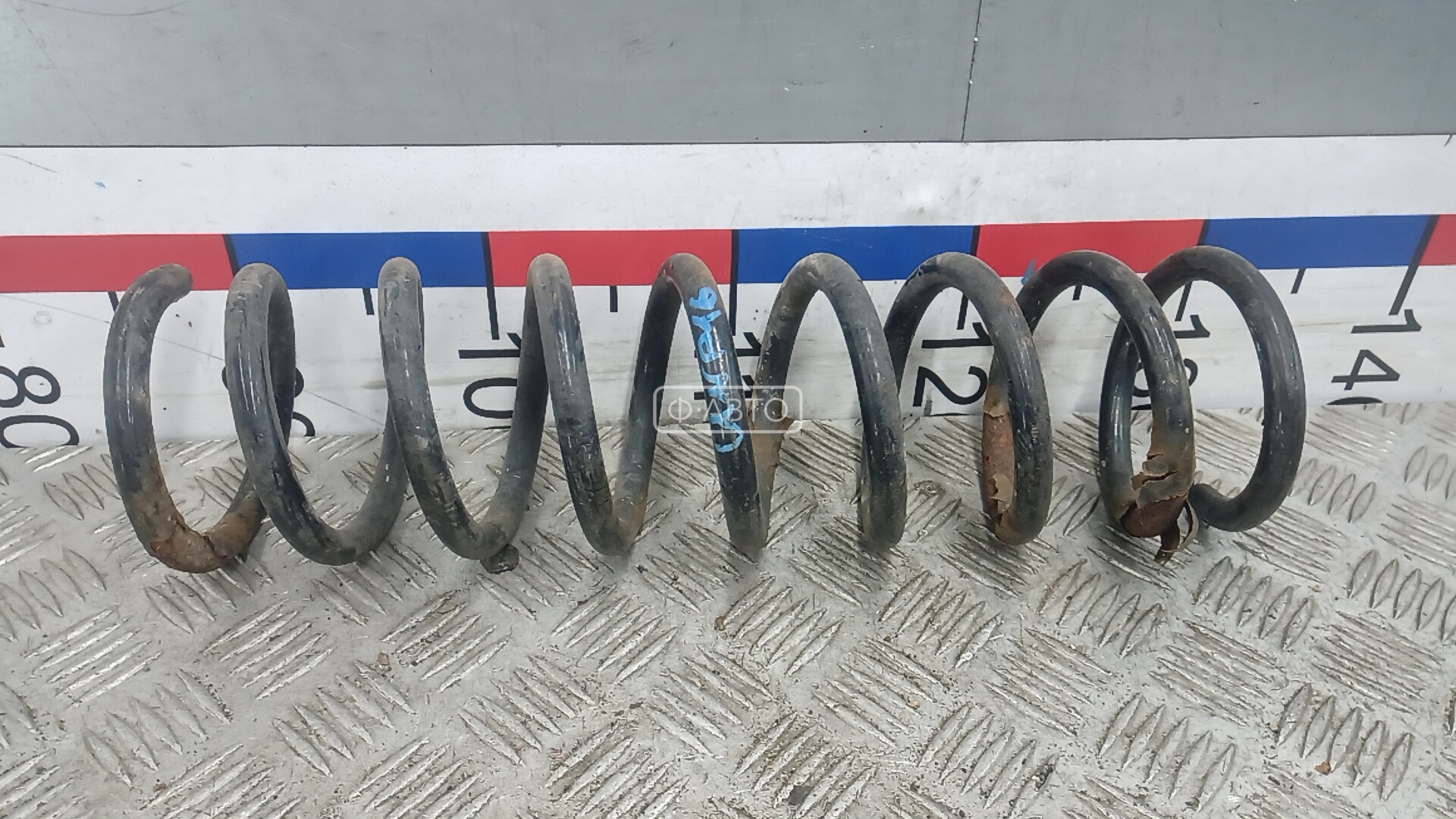 Пружина задняя