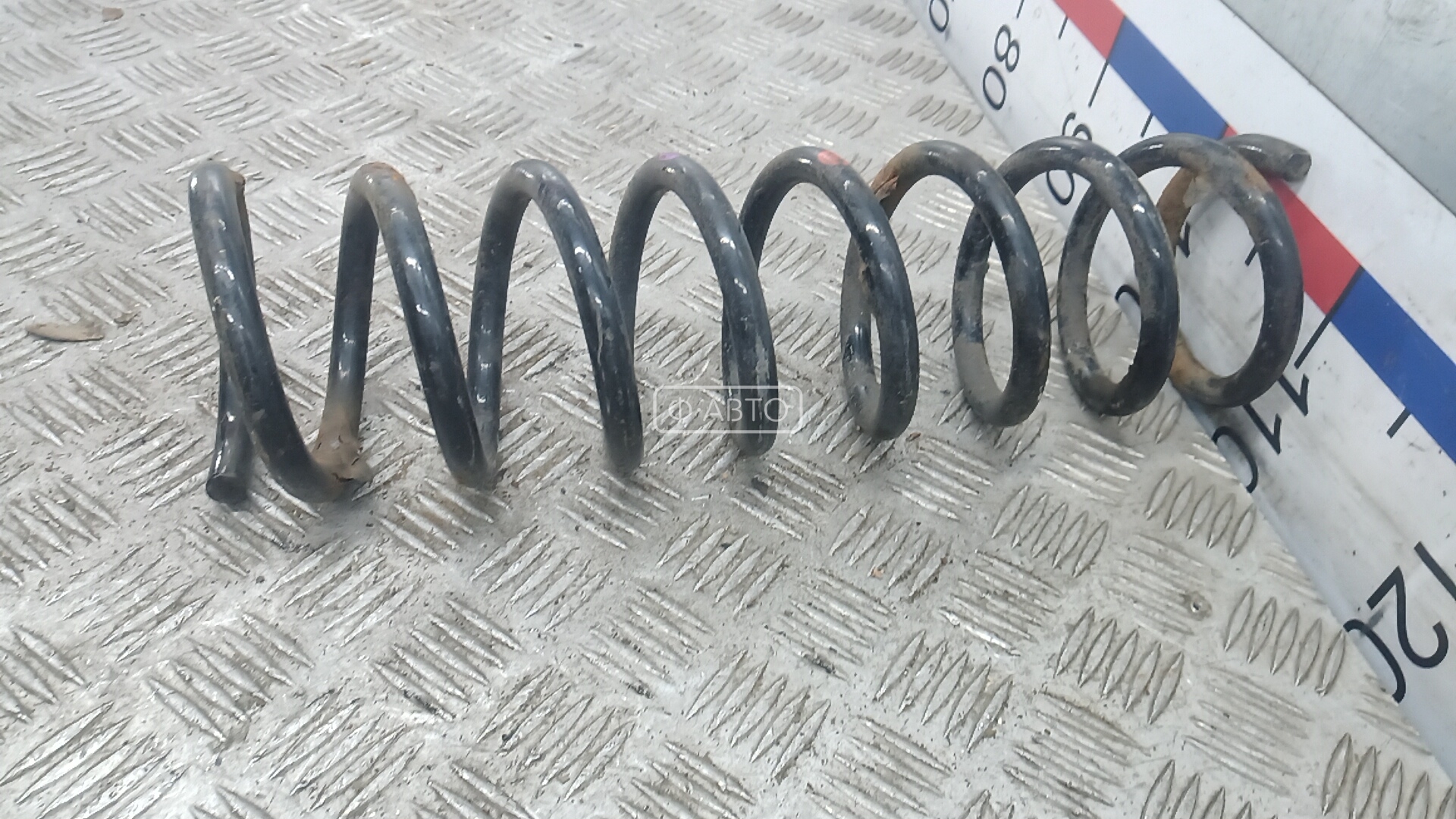 Пружина задняя