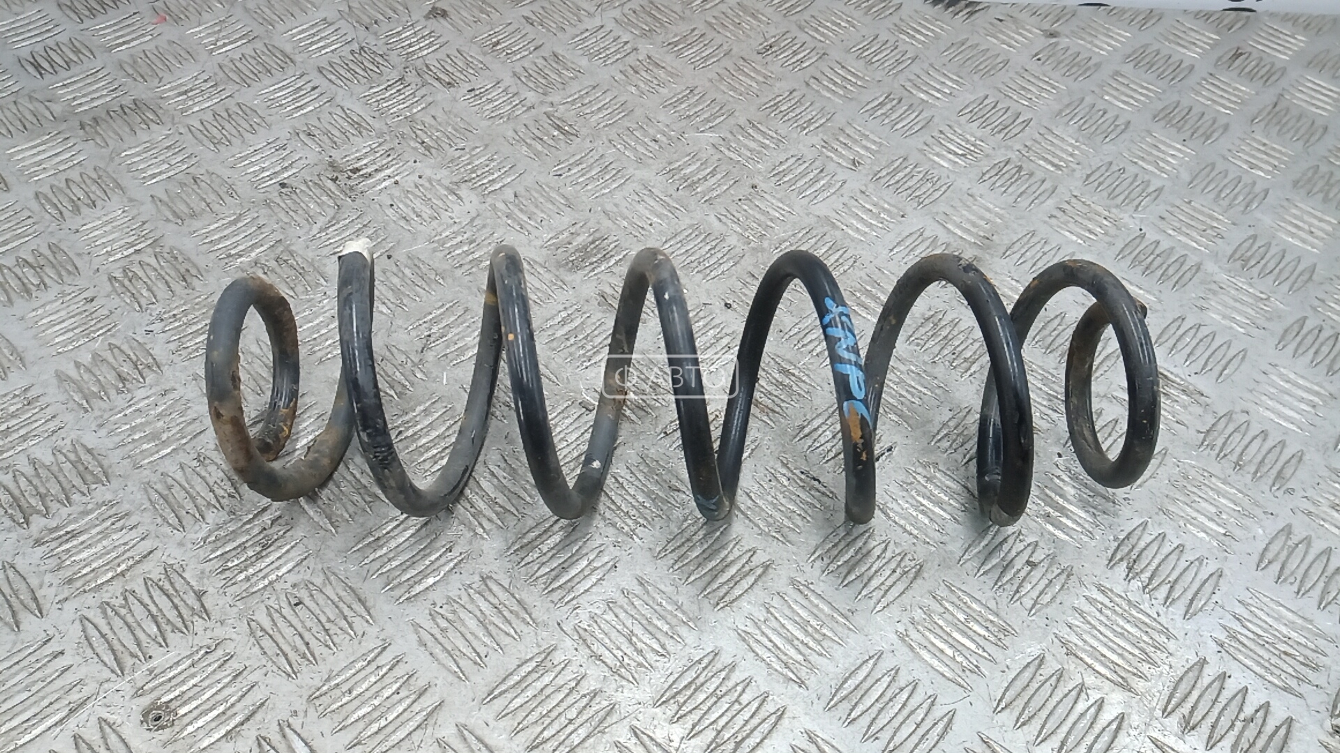 Пружина задняя