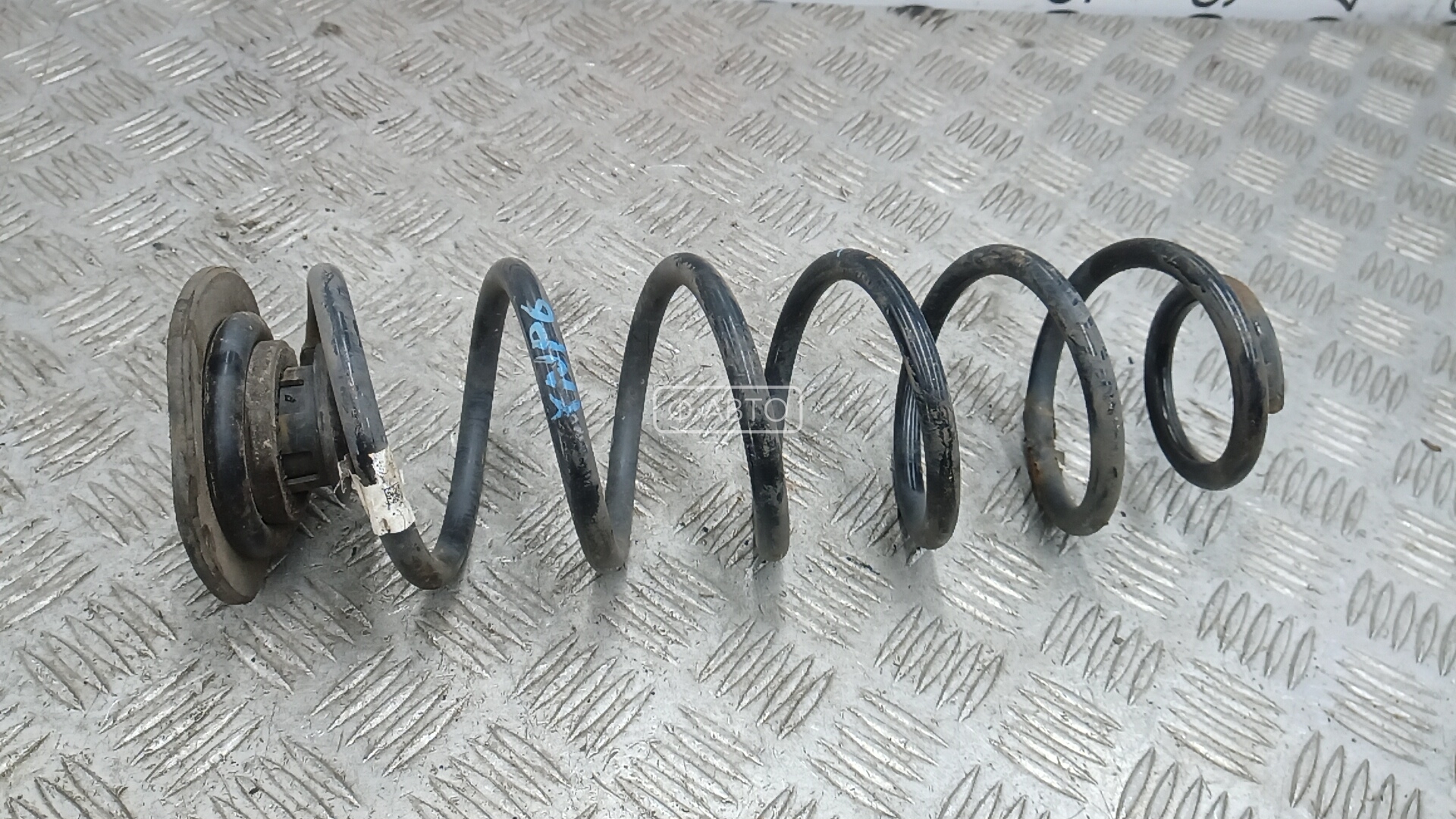 Пружина задняя