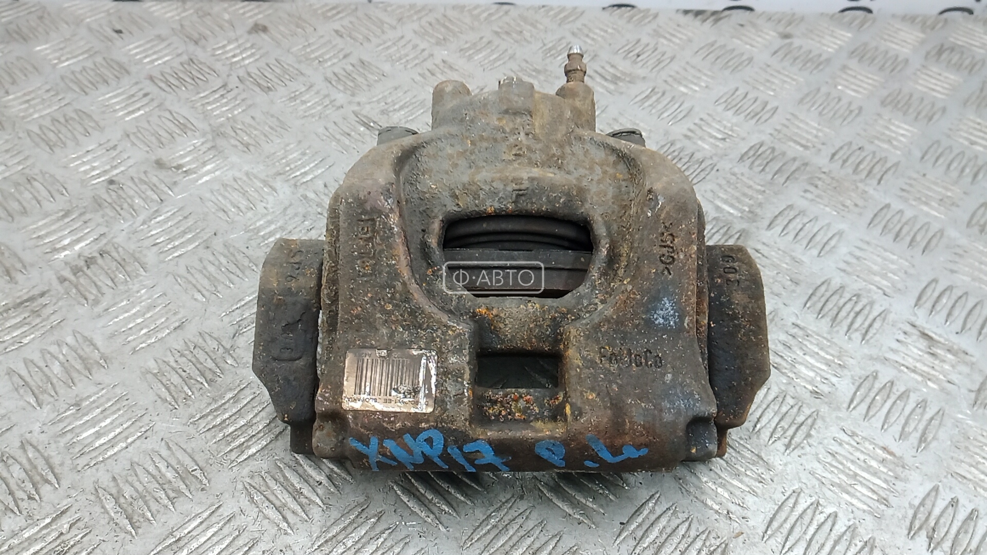 Суппорт тормозной передний левый