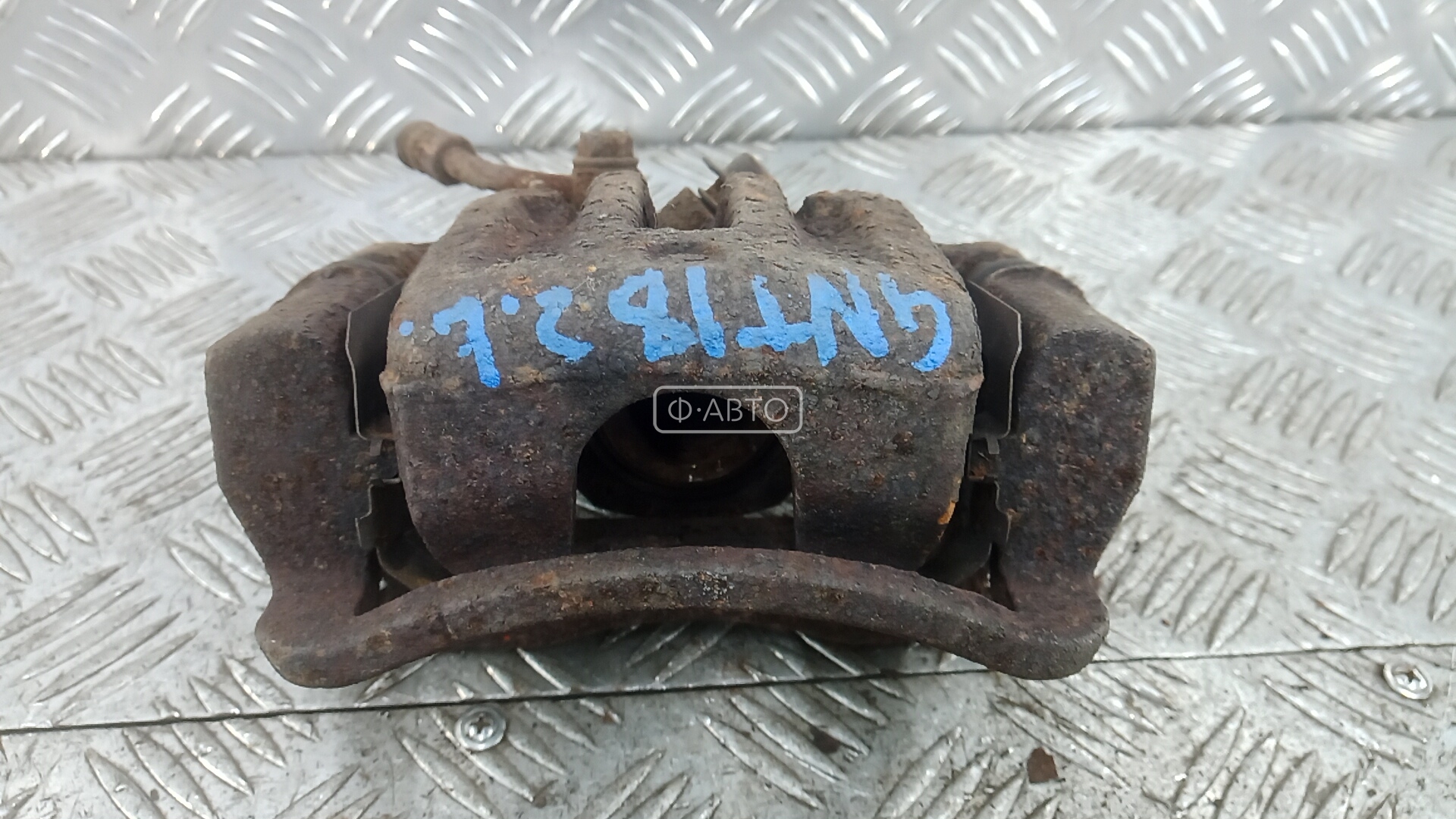 Суппорт тормозной задний левый