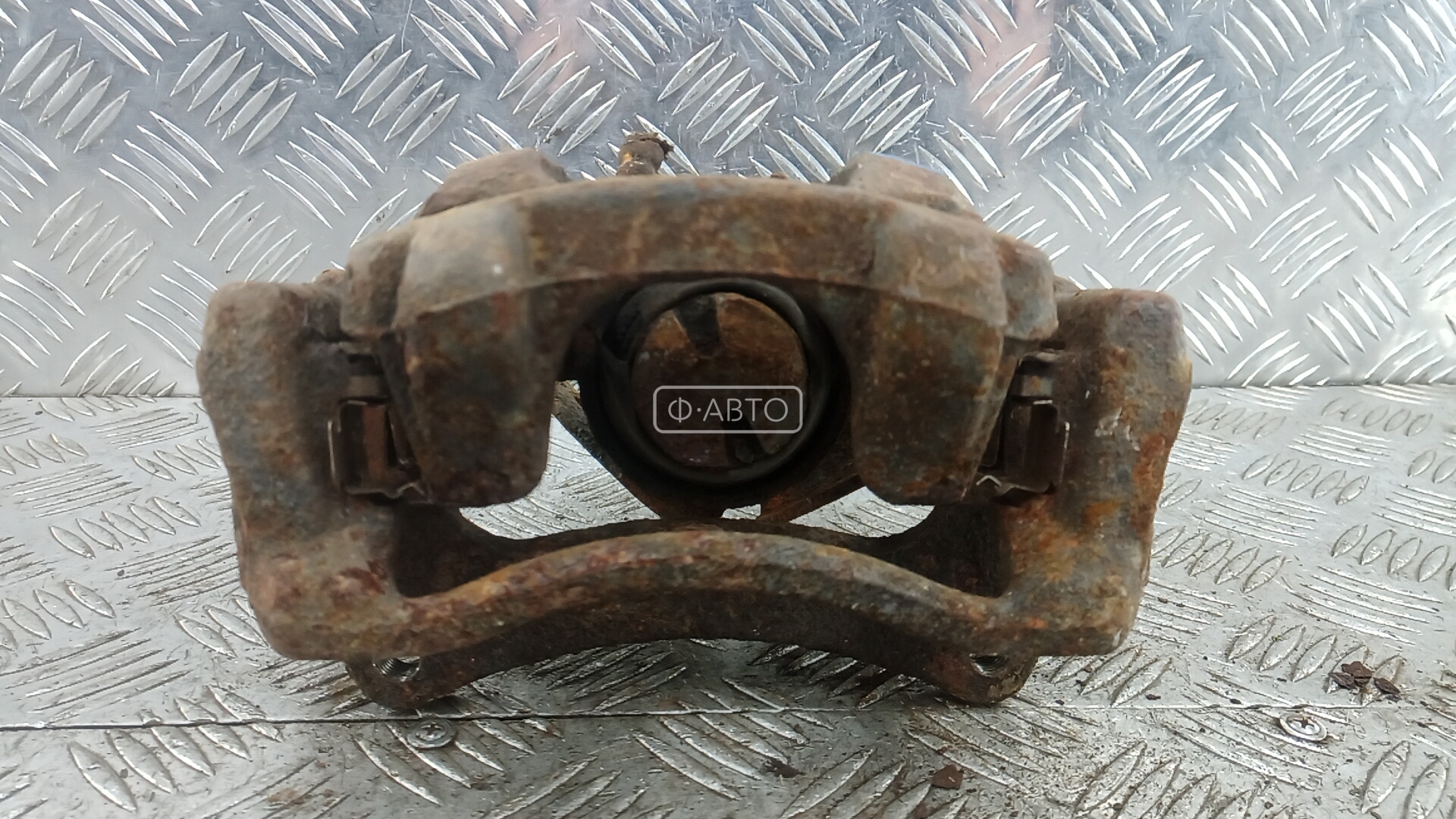 Суппорт тормозной задний левый