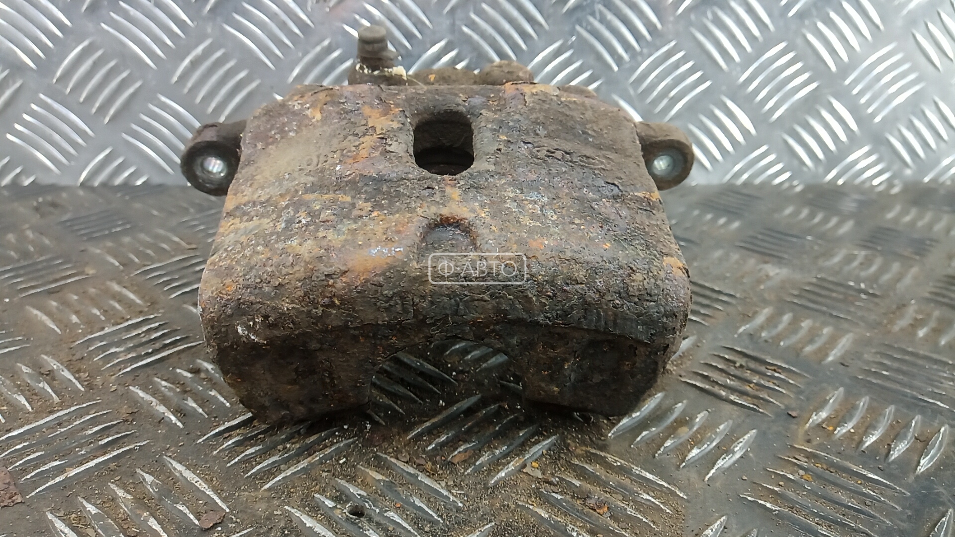 Суппорт тормозной передний левый