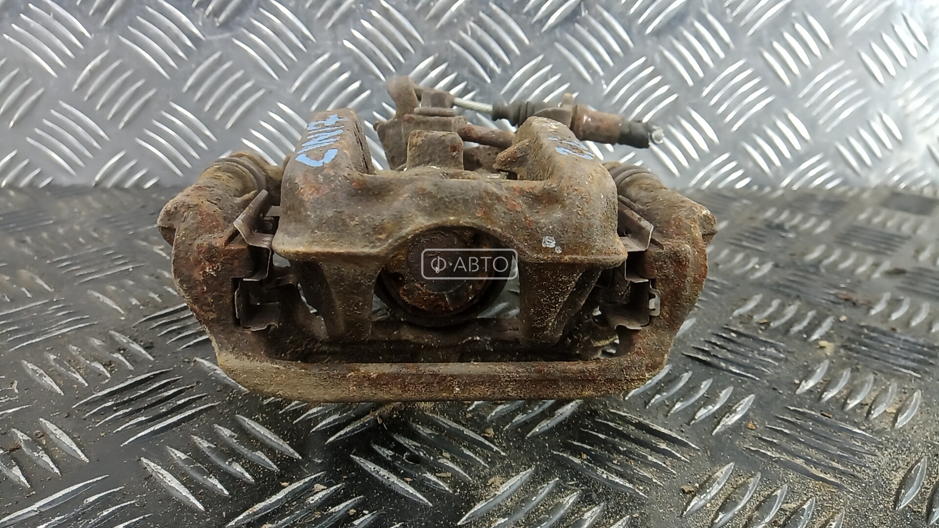 Суппорт тормозной задний левый